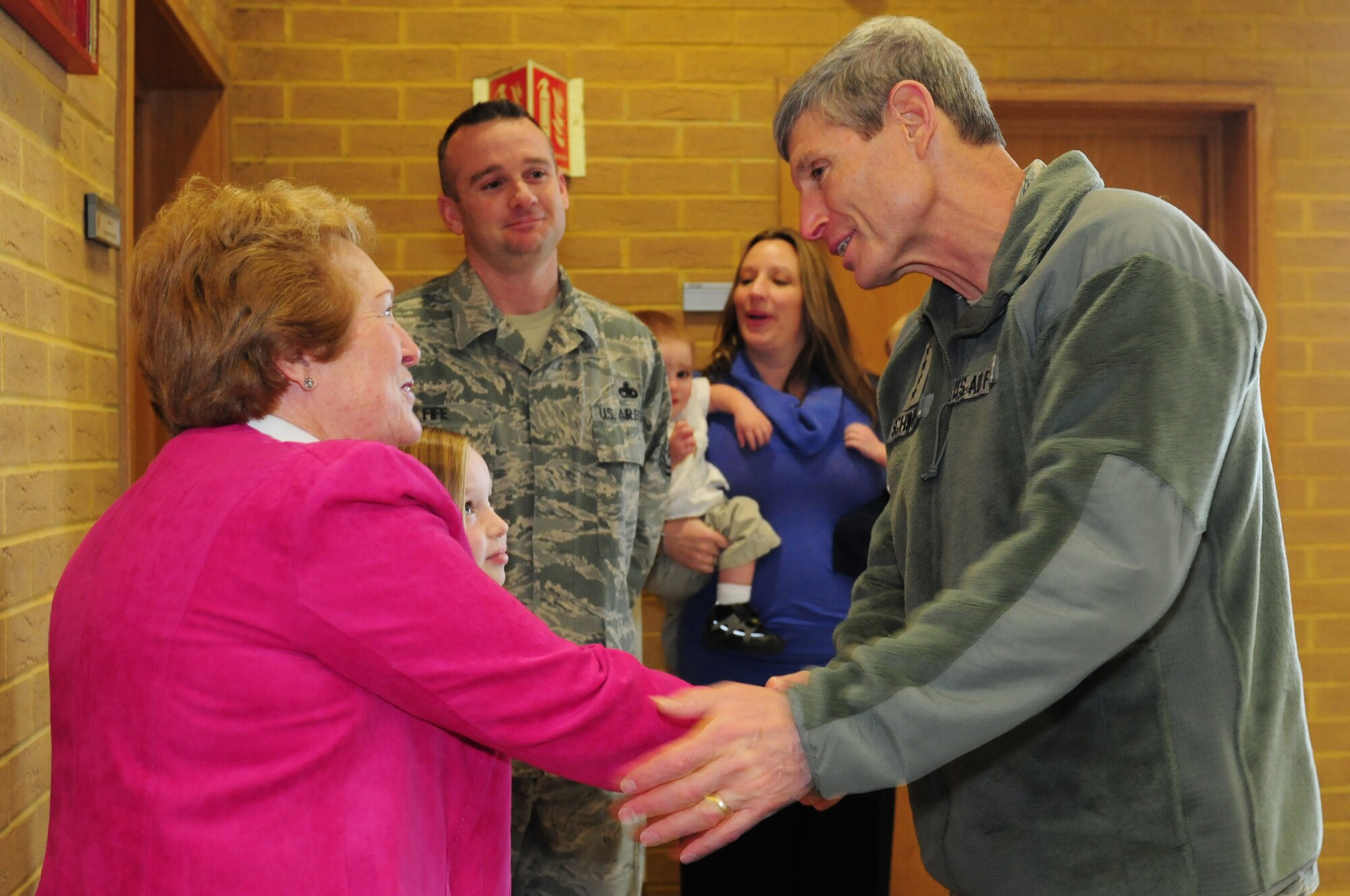 ROYAL AIR FORCE LAKENHEATH, England -- Air Force Chief of Staff Gen. Norton Schwartz, greets Linda Fife, mother of Senior Master Sgt. Kevin Fife, 56th Helicopter Maintenance Unit NCO in charge, prior to an awards presentation at the Strike Eagle Complex, Feb. 10, 2012. Fife was presented the Airman’s Medal for his bravery and heroism in support of Operation Enduring Freedom. (U.S. Air Force photo by Senior Airman Lausanne Morgan)
