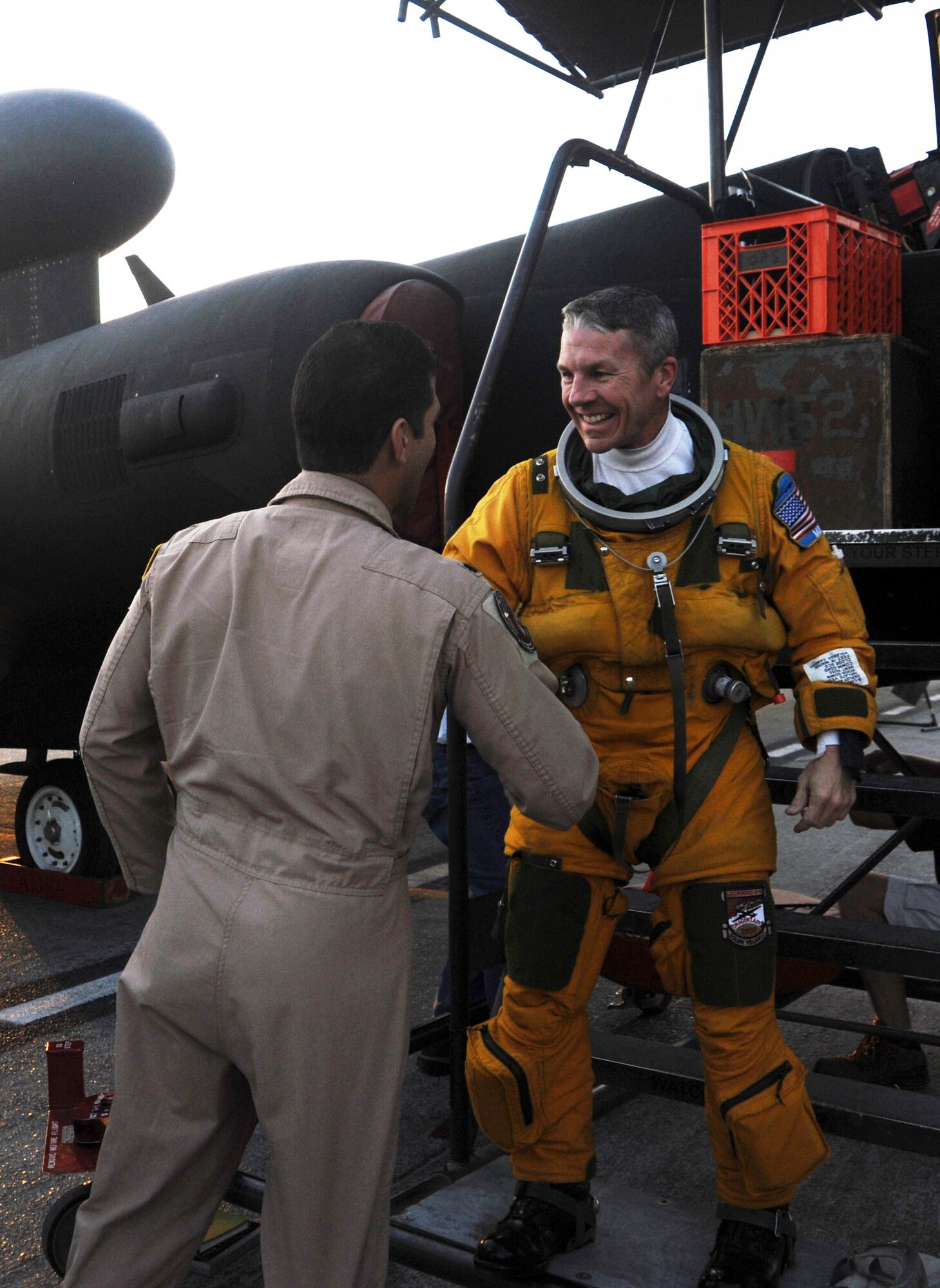 SOUTHWEST ASIA - Lt. Col. Alberto Cruz, 380th Expeditionary Operations Group deputy commander, congratulates Maj. Mark after he reached 2,000 flight hours in the U-2 Feb. 10, 2012. Mark, a Mobile, Ala., native, is deployed from Beale Air Force Base, Calif., to the 99th Expeditionary Reconnaissance Squadron. (U.S. Air Force photo/1st Lt. Victoria Porto)
