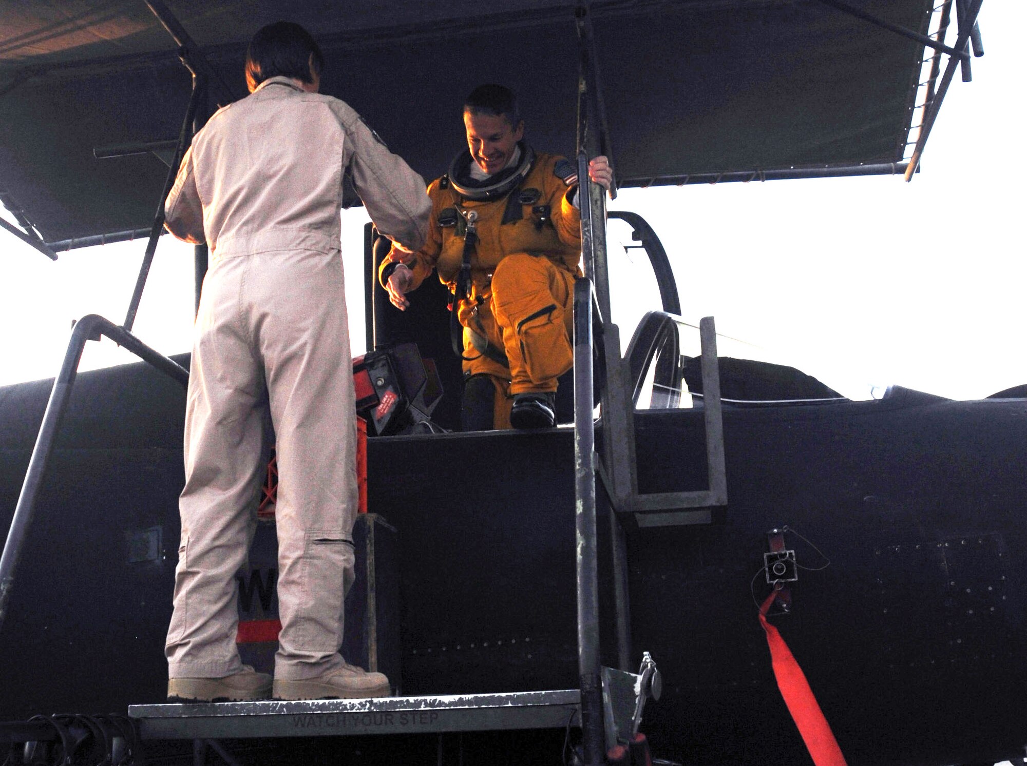 SOUTHWEST ASIA - Maj. Mark climbs out of a U-2 after reaching his 2,000th flying hour in the aircraft Feb. 10, 2012. The Mobile, Ala., native is deployed from Beale Air Force Base, Calif., to the 99th Expeditionary Reconnaissance Squadron. (U.S. Air Force photo/1st Lt. Victoria Porto)