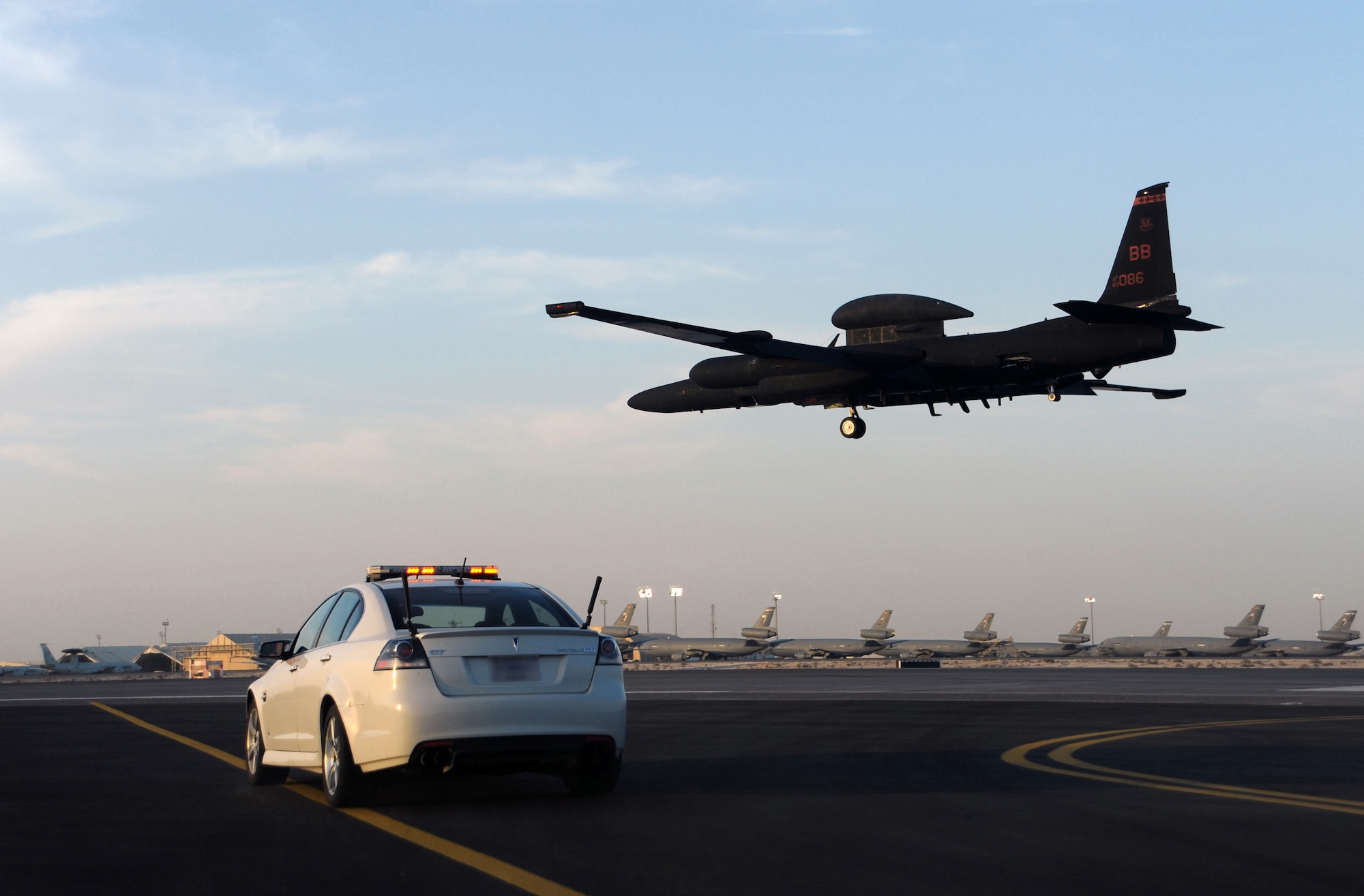 SOUTHWEST ASIA - Maj. Mark lands a U-2 as his wingman in a chase car follows along, guiding him to the runway Feb. 10, 2012. During the mission, Mark became just the 30th pilot to reach 2,000 flight hours in the aircraft. He is deployed from Beale Air Force Base, Calif., to the 99th Expeditionary Reconnaissance Squadron. (U.S. Air Force photo/1st Lt. Victoria Porto)