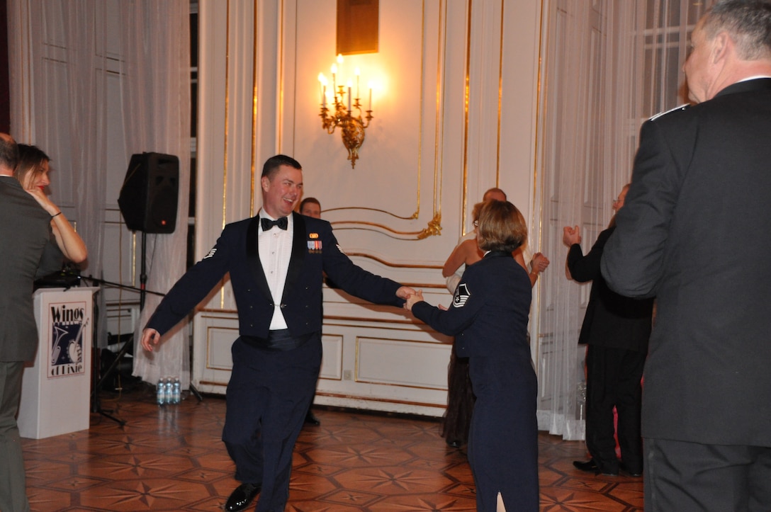SSGT Mannella and MSGT Adams enjoy a break from performing to dance to the sounds of Direct Hit (One of two USAFE Band's two popular music ensembles).