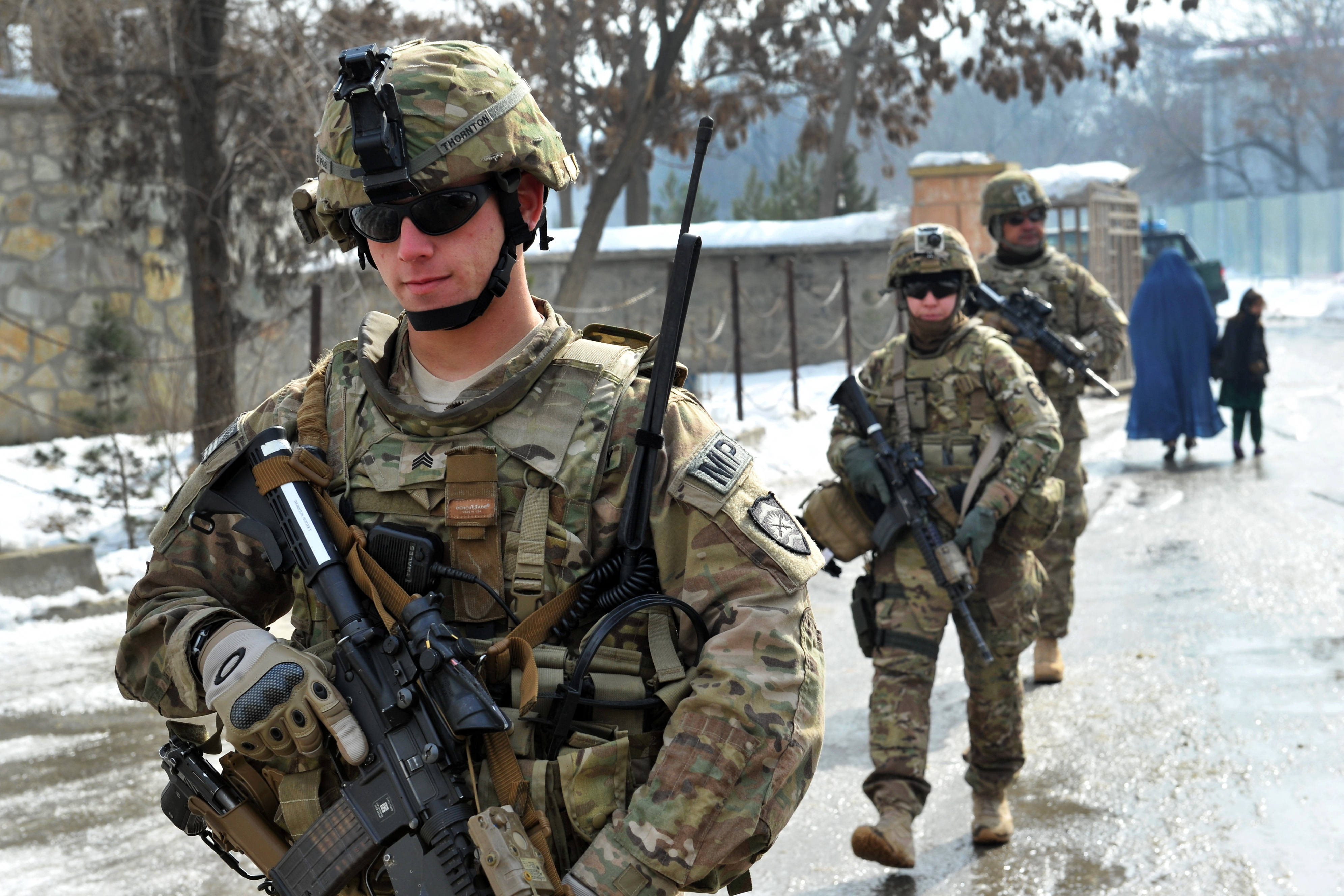 U.S. Army Sgts. Hunter Thorton, front, Crystal Cornejo