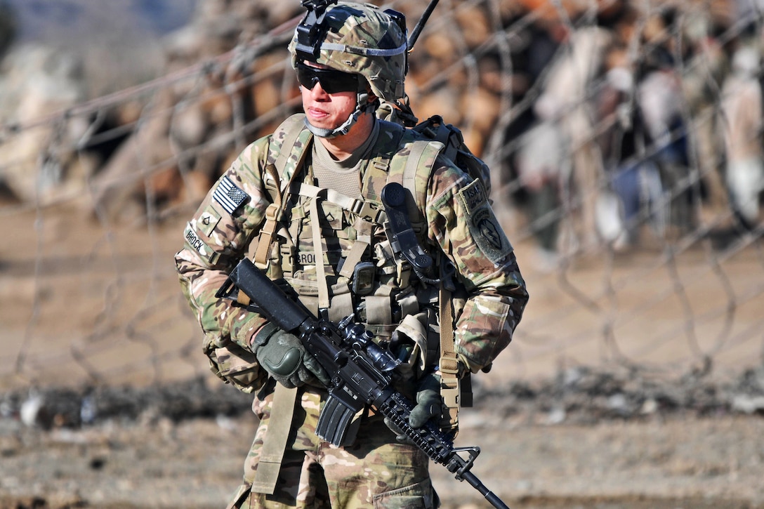 U.S. Army Pfc. Joshua Brock conducts a security patrol near the village of Narizah in Afghanistan's Tani district, Feb. 10, 2012. Brock is a forward observer assigned to the 501st Infantry Division's Company B, 1st Battalion Airborne. 
