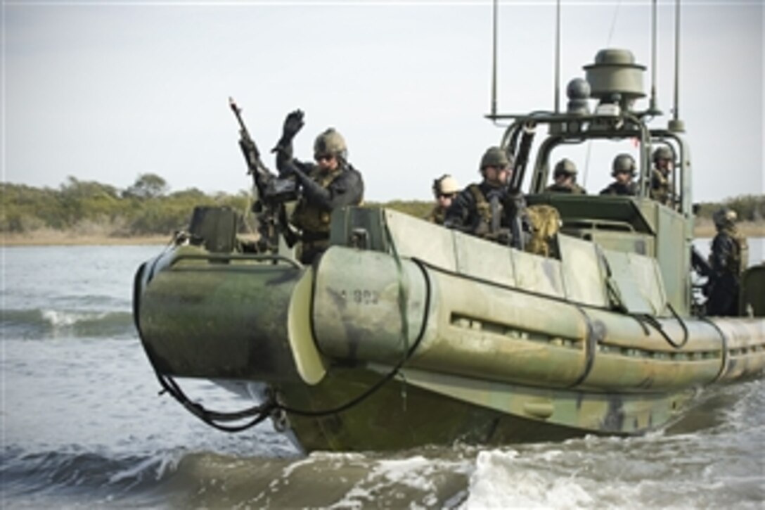 U.S. Navy sailors assigned to Riverine Squadron 1 conduct a hot extraction drill during Bold Alligator 2012 at Camp Lejeune, N.C., on Feb. 7, 2012.  Bold Alligator is a joint and multinational amphibious assault exercise involving several foreign militaries and the U.S. Navy and Marine Corps, designed to execute brigade-sized amphibious assaults against low-to-medium land and maritime threats to improve amphibious core competencies.  