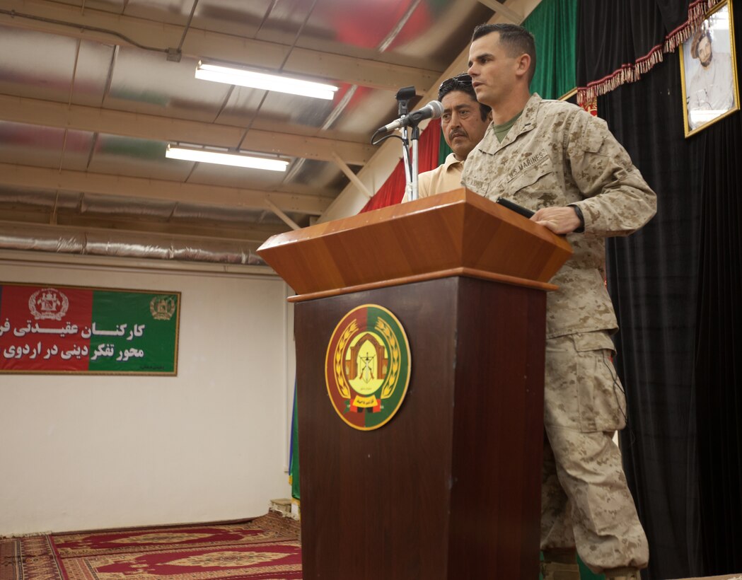 First Lt. John McJunkin, the operation and maintenance budget officer for Regional Command Southwest, speaks to financial representatives of the Afghan National Army’s 3rd Brigade, 215th Corps during a meeting at the Afghans’ headquarters at Camp Shorabak, Helmand province, Sept. 17. The purpose of the meeting was to discuss how to fix pay problems existing within the 215th Corps.