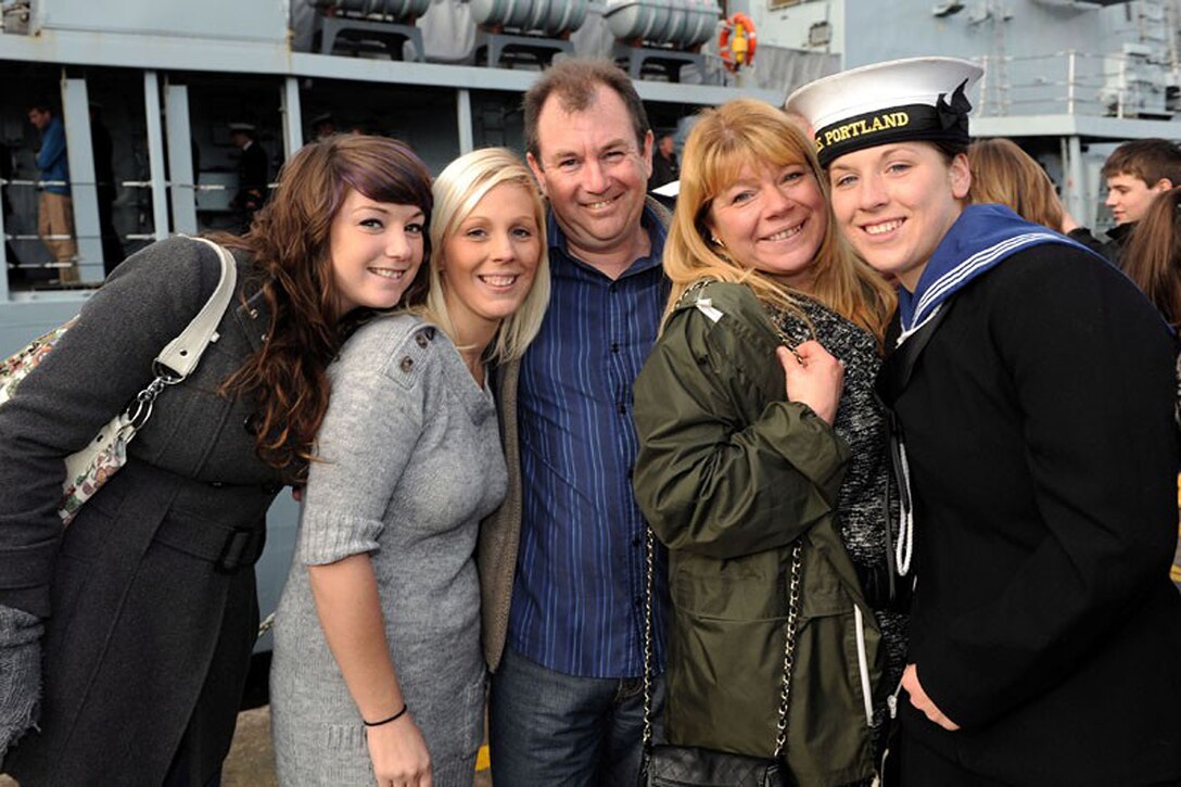 Able Seaman Heidi Telford is reunited with her family in Plymouth, U.K., after a seven-month deployment aboard the Her Majesty’s Ship Portland, November 16, 2010. Telford, a native of Plymouth, U.K., is a member of the Female Engagement Team and is currently assigned to the 1 Rifles Battle Group in Nahr-e-Saraj, Helmand province.