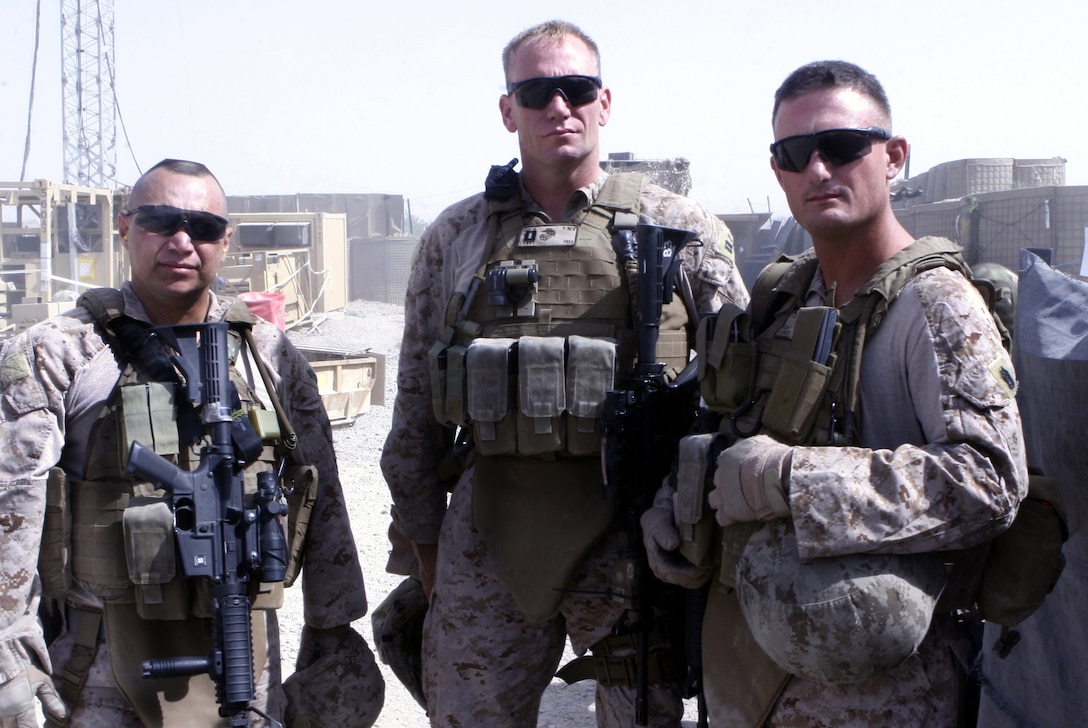 110829-M-TG308-005
Shortly after arriving at Patrol Base 1 in Helmand, Master Gunnery Sgt. Steve Jackson (left), Capt. Chad Lowry (center) and Gunnery Sgt. Bryan Tanner (right), set out to ensure a group of Afghan Local Police members receive their monthly salary.
MGySgt. Phil Mehringer