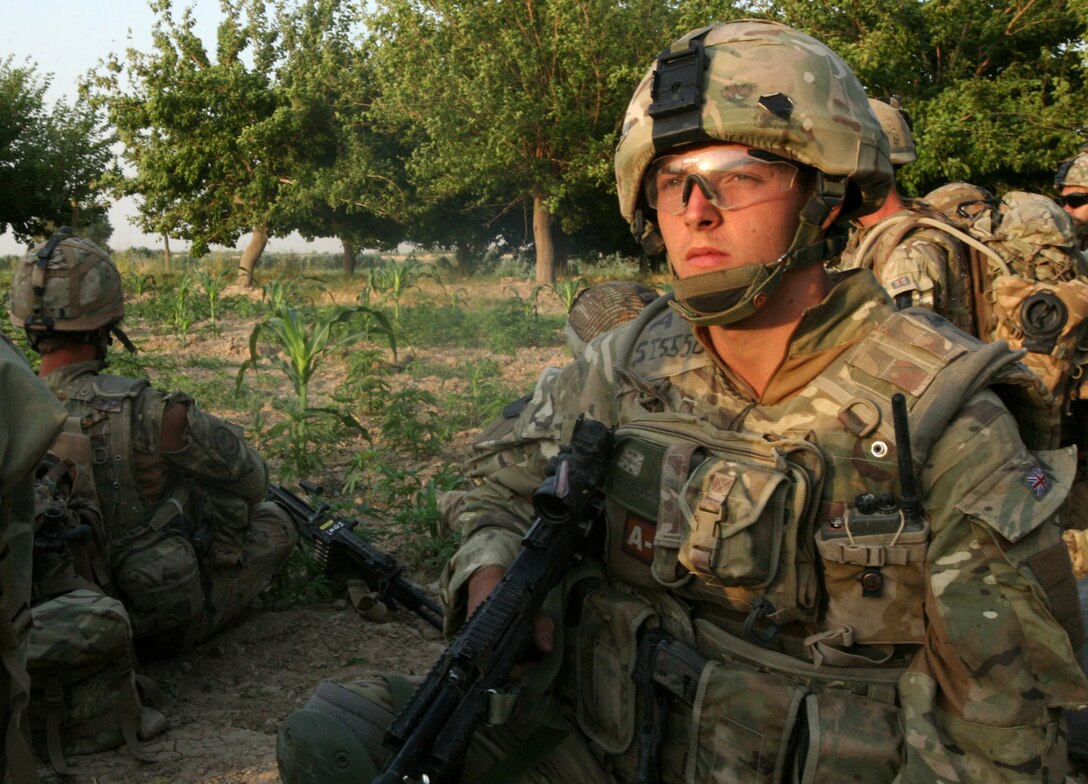 110708-N-XXXXS-026 ROUTE URANUS, Helmand province (July 8, 2011) Royal Marine Lance Cpl. Martin Simmons of Lincoln City, United Kingdom, waits for an air extraction after completing a route clearing mission by the Royal Marines 42nd Commando Unit, J Company, along route Uranus, here, July 8.  J Company cleared the route from Loy Mandeh Kalay south to Lashkar Gah of IED threats and established freedom of movement for ISAF and Afghan nationals in the area. (Official U.S. Navy photo by Mass Communication Specialist 2nd Class Matt Snodgrass/Released)