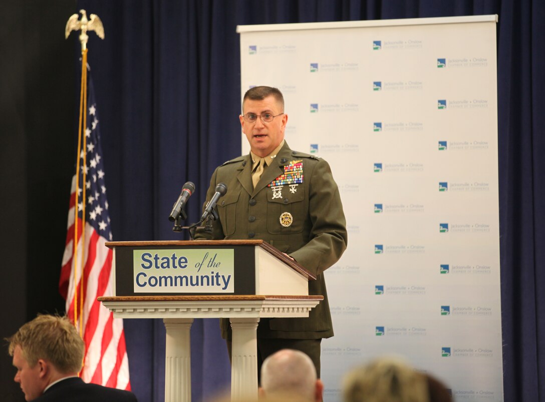 Col. Jeffrey Hewlett speaks at the State of the Community Breakfast Feb. 14 in Jacksonville. Marine Corps Air Station New River will gain a large hanger, more housing, roadwork to improve access to the base, a new gym with an Olympic-size swimming pool and large parking garages throughout the year.