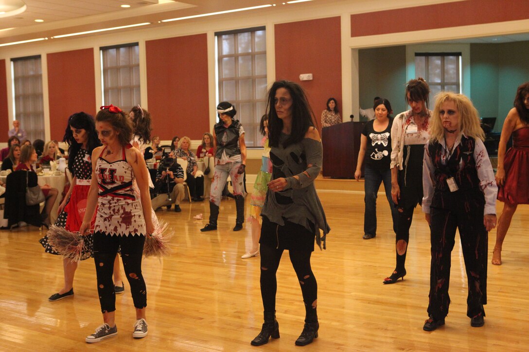 Wives dressed as zombies dance during the Officers Wives’ Club annual luncheon at Marston Pavilion aboard Marine Corps Base Camp Lejeune, Feb. 14. Dancing with Division was theme for the 2nd Marine Divisions OWC.