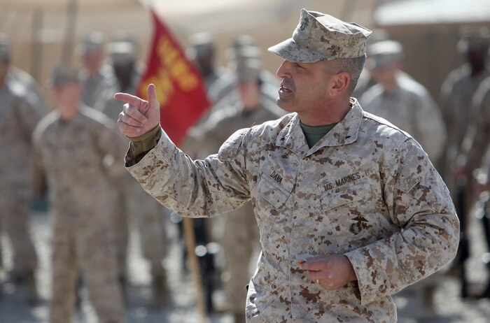 Brig. Gen. Michael G. Dana, commanding general of 2nd Marine Logistics Group (Forward), lauds the performance of his Marines and Sailors during a transfer of authority ceremony aboard Camp Leatherneck, Afghanistan, Feb. 15. After year-long deployment in support of International Security Assistance Force operations in southern Afghanistan, 2nd MLG (FWD) relinquished logistical support responsibilities to 1st MLG (FWD). (U.S. Marine Corps photo by Sgt. Justin J. Shemanski)