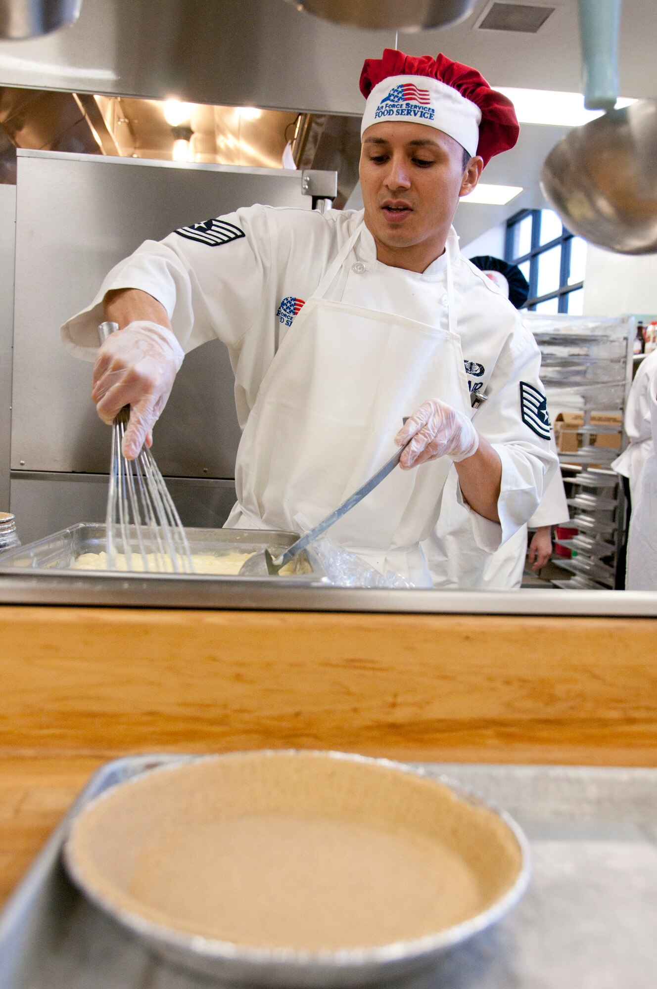 Tech. Sgt. Tony Jurado makes desert for members of the 162nd Fighter Wing during the February unit training assembly, Feb. 11. The wing’s dining facility and staff were visited over the drill weekend by an evaluation team for the Senior Master Sgt. Kenneth W. Disney Food Service Award – the Air National Guard’s highest honor for food service. The 162nd is one of two finalists in the competition. Though the team awarded the unit’s food service with a rating of “Excellent,” the winner won’t be announced until March. (U.S. Air Force photo/Tech. Sgt. Hollie Hansen)