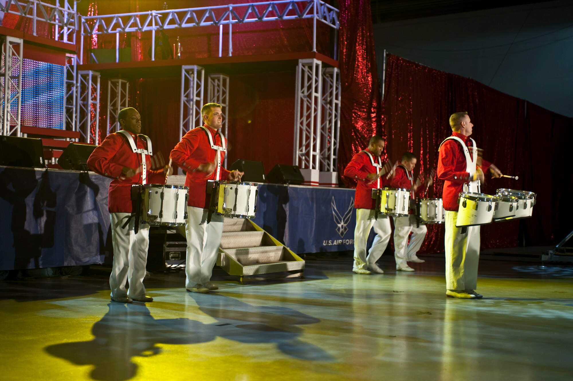 Tops in Blue members perform during a concert at the Freedom Hangar on Hurlburt Field, Fla., Feb. 11, 2012.Tops in Blue, the premier entertainment showcase of the Air Force, has been playing for nearly 60 years. (U.S. Air Force Photo/Airman 1st Class Hayden K. Hyatt) (Released)

