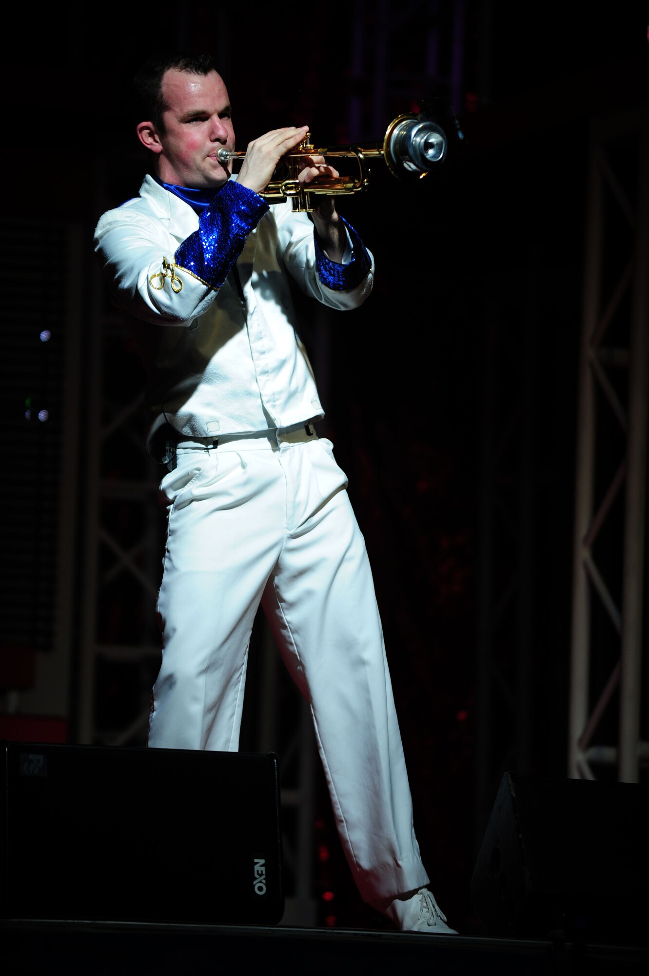 Senior Airman James Santos, a Tops in Blue performer, plays the trumpet at a concert inside the Freedom Hangar on Hurlburt Field, Fla., Feb. 11, 2012.  Tops in Blue?s tour schedule includes concerts in more than 120 locations around the world. (U.S. Air Force photo/Airman 1st Class Gustavo Castillo)(Released)