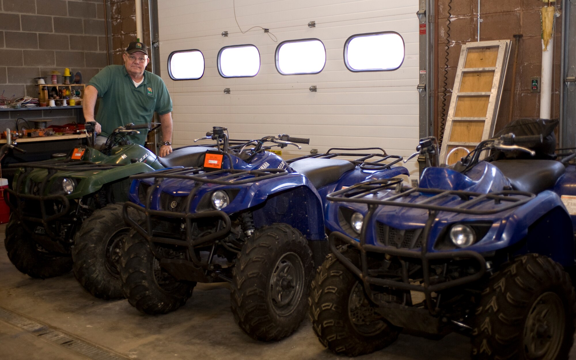 Al Nelson, Outdoor Recreation manager, displays the all-terrain vehicles at the Outdoor Recreation facility on Ellsworth Air Force Base, S.D., Feb. 9, 2012.  For information regarding renting all-terrain vehicles and other outdoor recreation equipment, contact the outdoor recreation facility at 385-2997.  (U.S. Air Force photo by Airman 1st Class Anania Tekurio/Released)