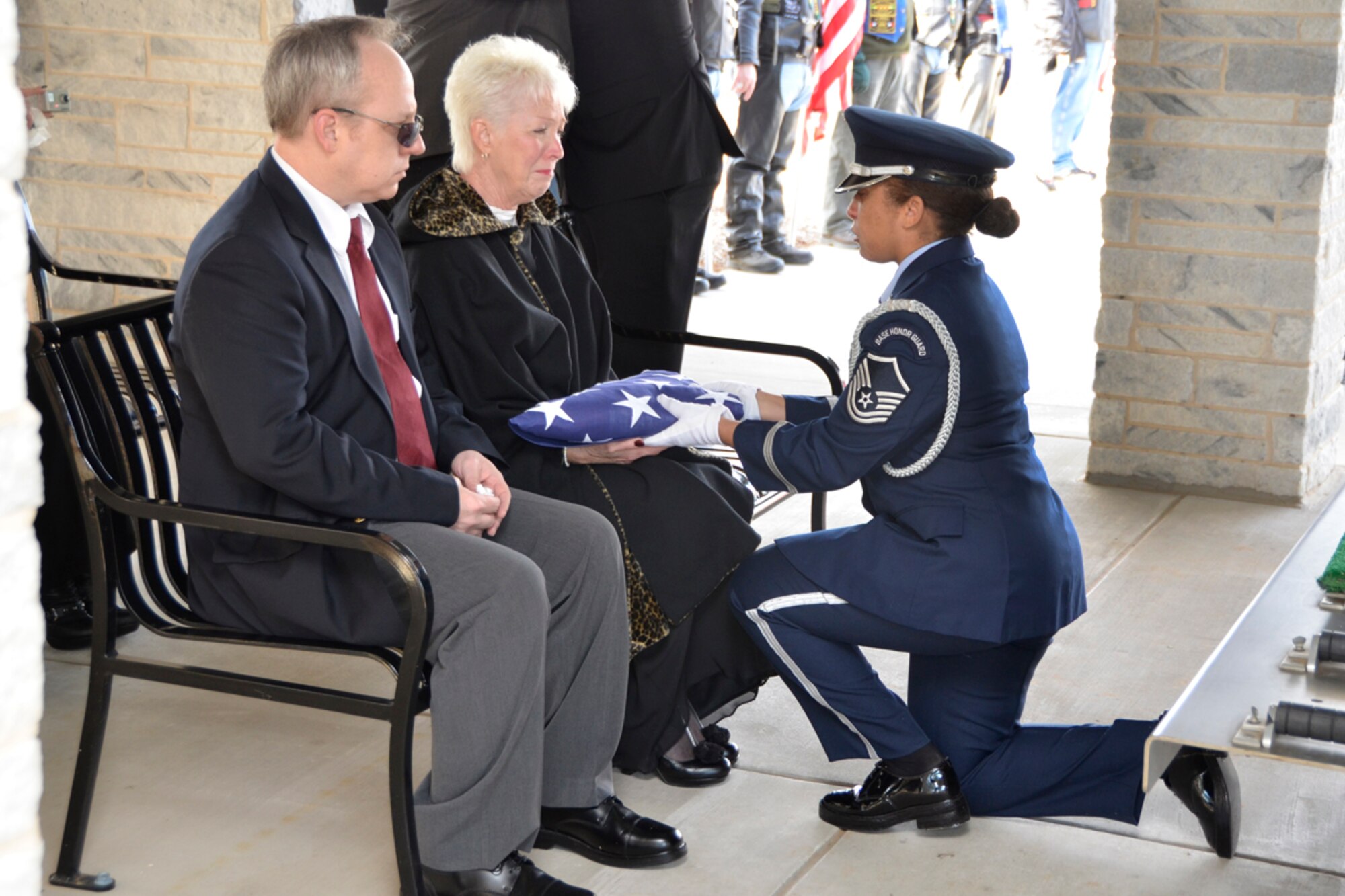 “On behalf of the President of the United States, the Department of the Air Force, and a grateful nation, our country's flag is presented to you as a token of appreciation for years of honorable and faithful service by your loved one,” said Master Sgt. Lena Tamplin, 94 AW Honor Guard, as she presented the U.S. Flag to Gerald A. Marshall’s wife, Saundra, Feb. 13. Marshall, retired U.S. Air Force Master Sgt. and civil servant, was honored at memorial services at the Chapel of West Cobb Funeral home and an inurnment at the Georgia National Cemetery in Canton, Ga.