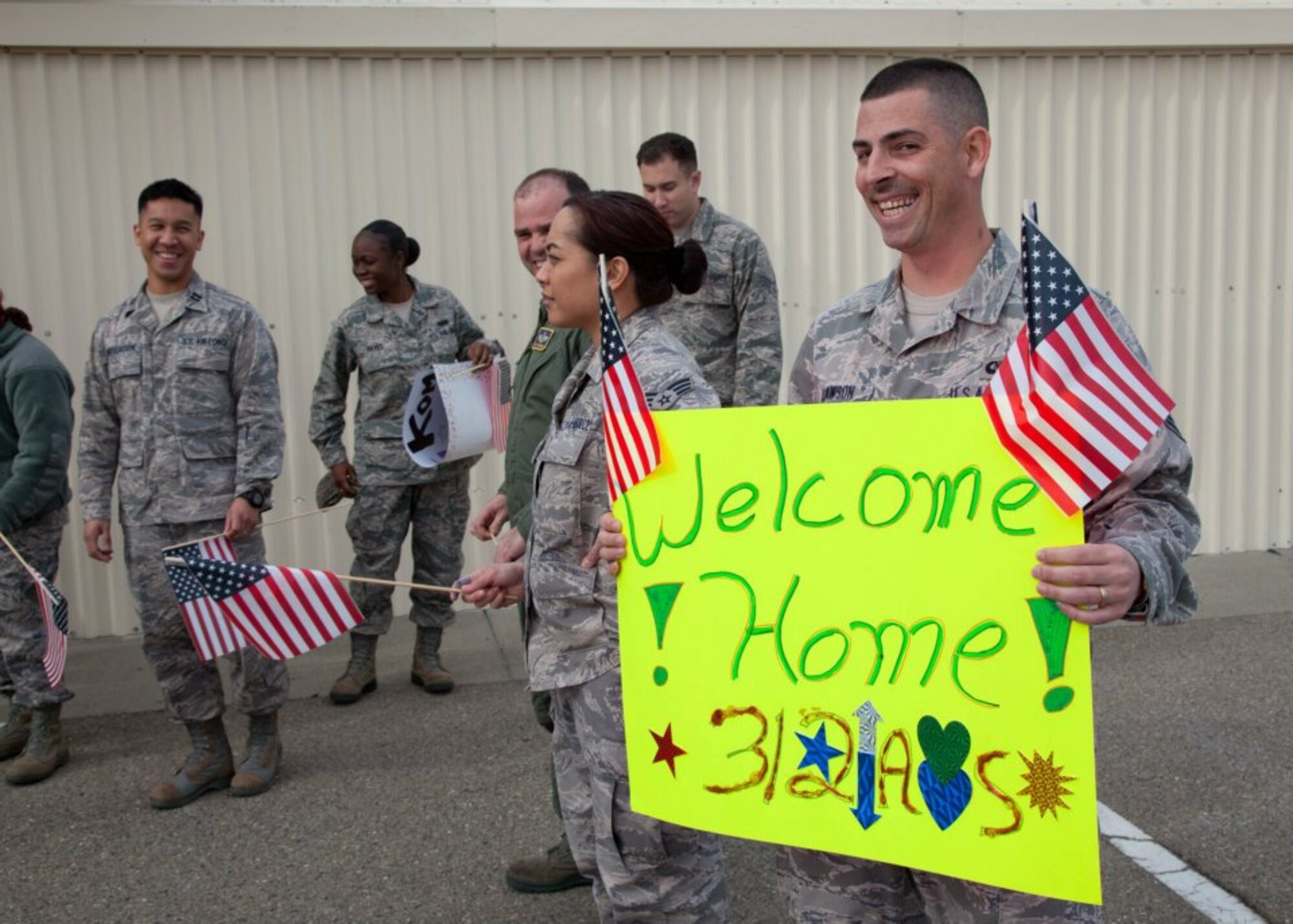 TRAVIS AIR FORCE BASE, Calif. -- C-5 Galaxy aircrew from the 312th Airlift Squadron and 22th Airlift Squadron return to Travis Air Force Base, Calif., Feb. 12, 2012, after supporting Operation Enduring Freedom. The C-5 Galaxy is the largest aircraft in the U.S. Air Force fleet, optimized for moving large and heavy cargo. The reserve and active-duty troops from the 349th and 60th Air Mobility Wings were met by their friends and family at the base in the San Francisco Bay Area. (U.S. Air Force photo / Lt. Col Robert Couse-Baker) 