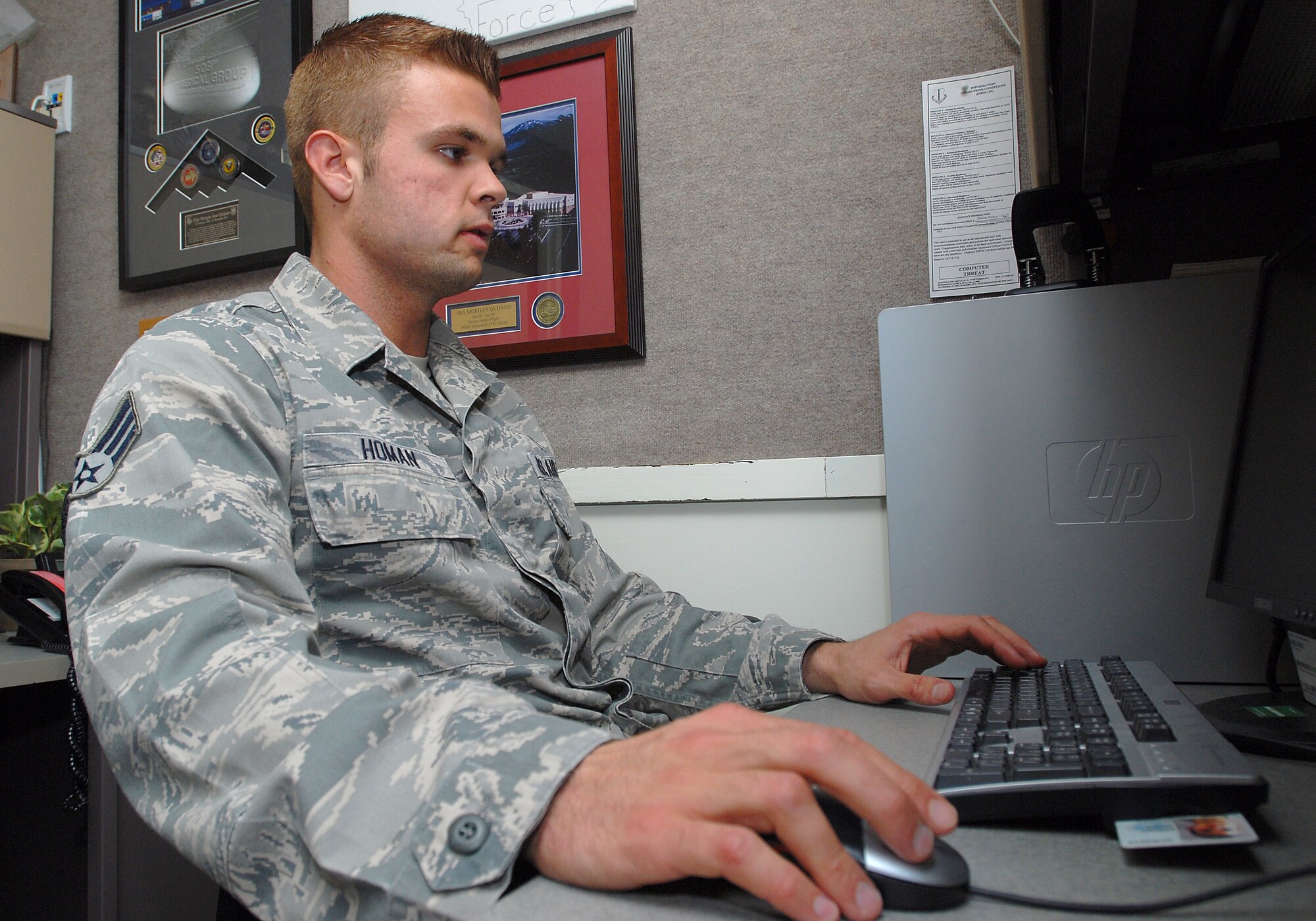 GOODFELLOW AIR FORCE BASE, Texas—Senior Airman Grant Homan, 17th Medical Operations Squadron, works on an assignment Feb. 10 here. Homan is the recipient of the Air Force level Outstanding Mental Health Airman of the year award. (U.S. Air Force photo/Airman 1st Class Michael Smith)