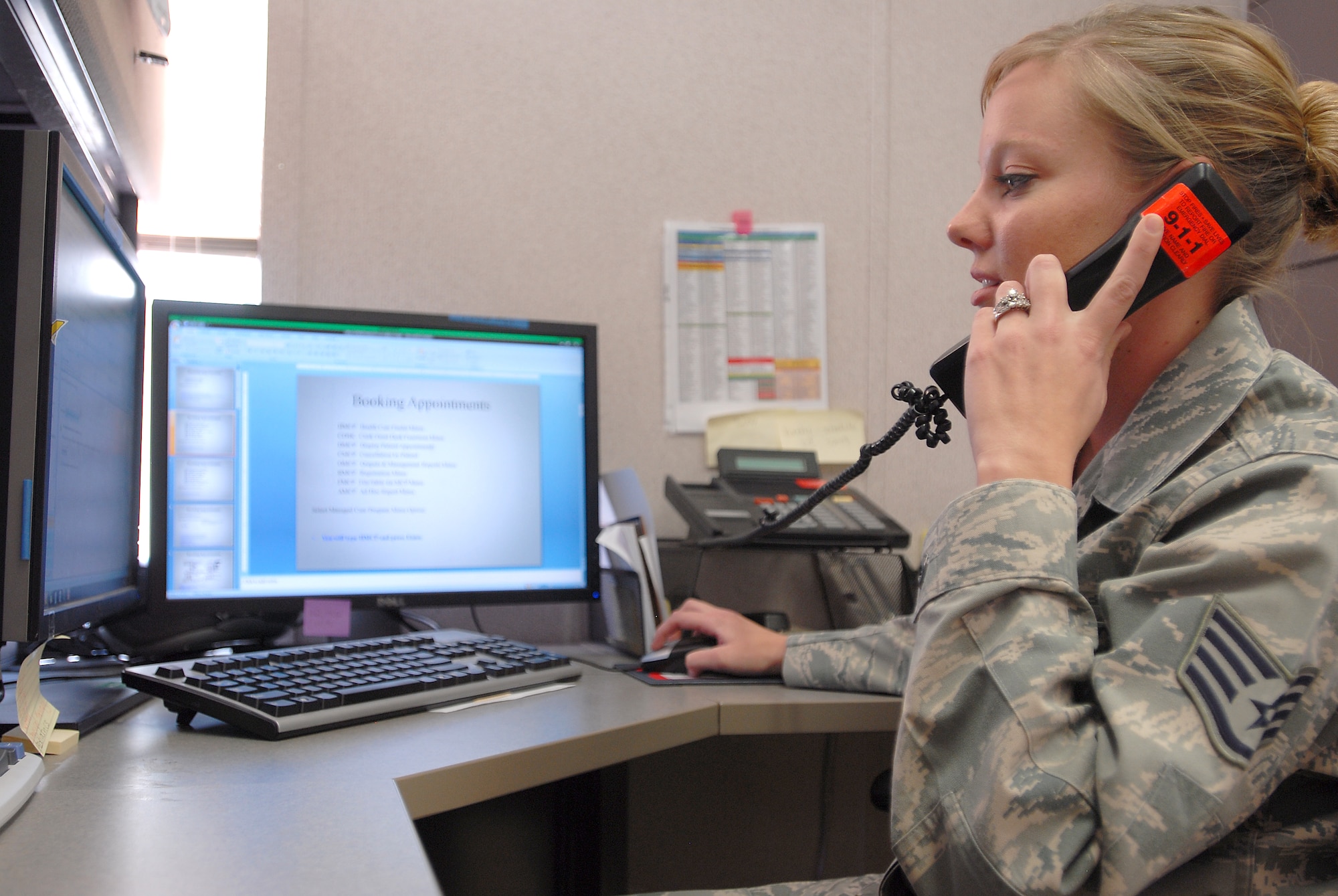 GOODFELLOW AIR FORCE BASE, Texas—Staff Sgt. Stephanie Thompson, 17th Medical Support Squadron, answers the telephone Feb. 10 here. Thompson is the recipient of the Air Force level Outstanding Health Plan Management NCO of the year award. (U.S. Air Force photo/Airman 1st Class Michael Smith)