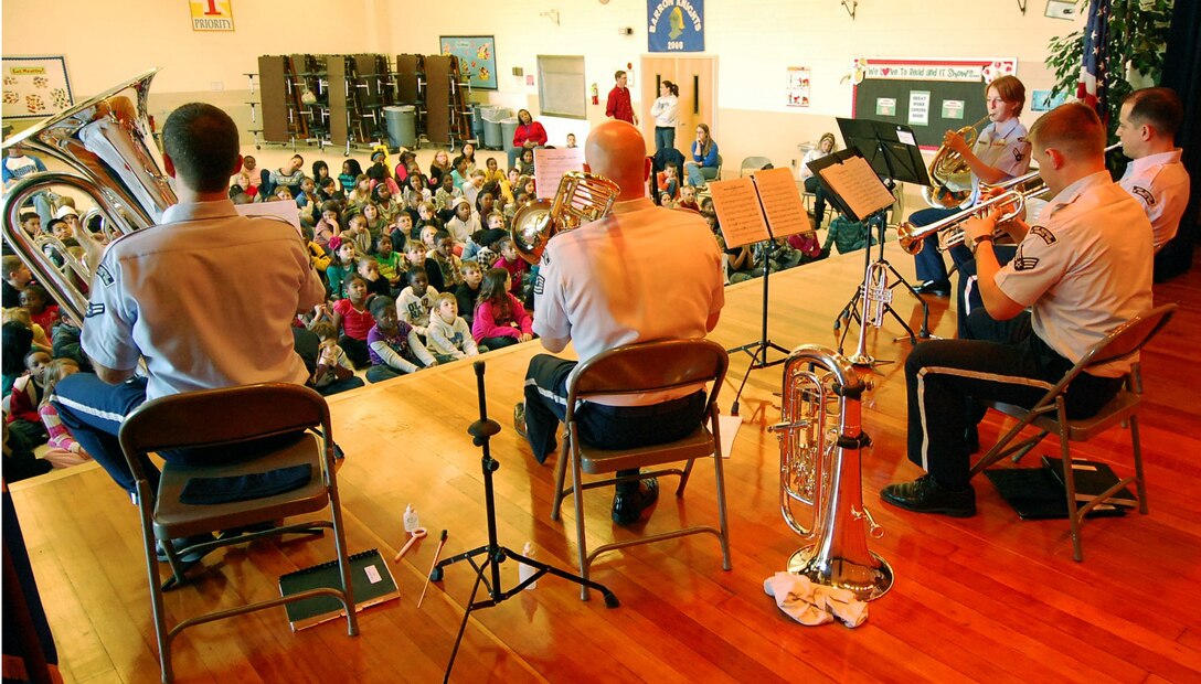 The U.S. Air Force Heritage of America Band’s Heritage Brass ensemble performs for students at Barron Elementary School in Hampton Feb. 3, 2012. According to Ray Landon, the band’s director of operations, developing a bond with Hampton’s schools is “a high priority,” and the band’s performances are one of many partnership opportunities between the city and Langley Air Force Base. (U.S. Air Force photo by Ray Landon/Released)
