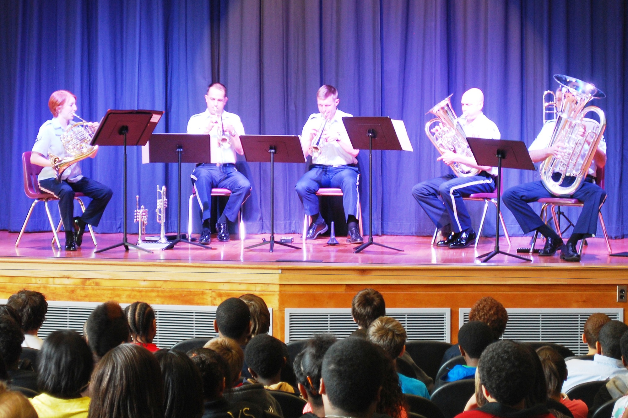 The U.S. Air Force Heritage of America Band’s Heritage Brass ensemble performs for students at Jefferson Davis Middle School in Hampton Feb. 1, 2012. The ensemble performed at several Hampton city schools in early February as part of Langley Air Force Base’s strategic outreach to the local community. (U.S. Air Force photo by Staff Sgt. Jamie Lantz/Released)