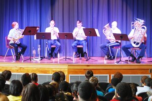The U.S. Air Force Heritage of America Band’s Heritage Brass ensemble performs for students at Jefferson Davis Middle School in Hampton Feb. 1, 2012. The ensemble performed at several Hampton city schools in early February as part of Langley Air Force Base’s strategic outreach to the local community. (U.S. Air Force photo by Staff Sgt. Jamie Lantz/Released)