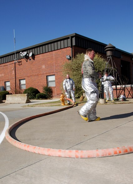 Airmen with the 188th Fire Emergency Services Flight conduct training at the 188th Fighter Wing during a Unit Training Assembly Feb. 11, 2012. In addition to the 188th FESF’s primary mission of providing fire protection to military aircraft and installation facilities, it also responds to emergency calls for commercial and civilian aircraft as well as medical emergencies through a joint-use agreement with the Fort Smith Regional Airport. (National Guard photo by Airman 1st Class John Hillier/188th Fighter Wing Public Affairs)

