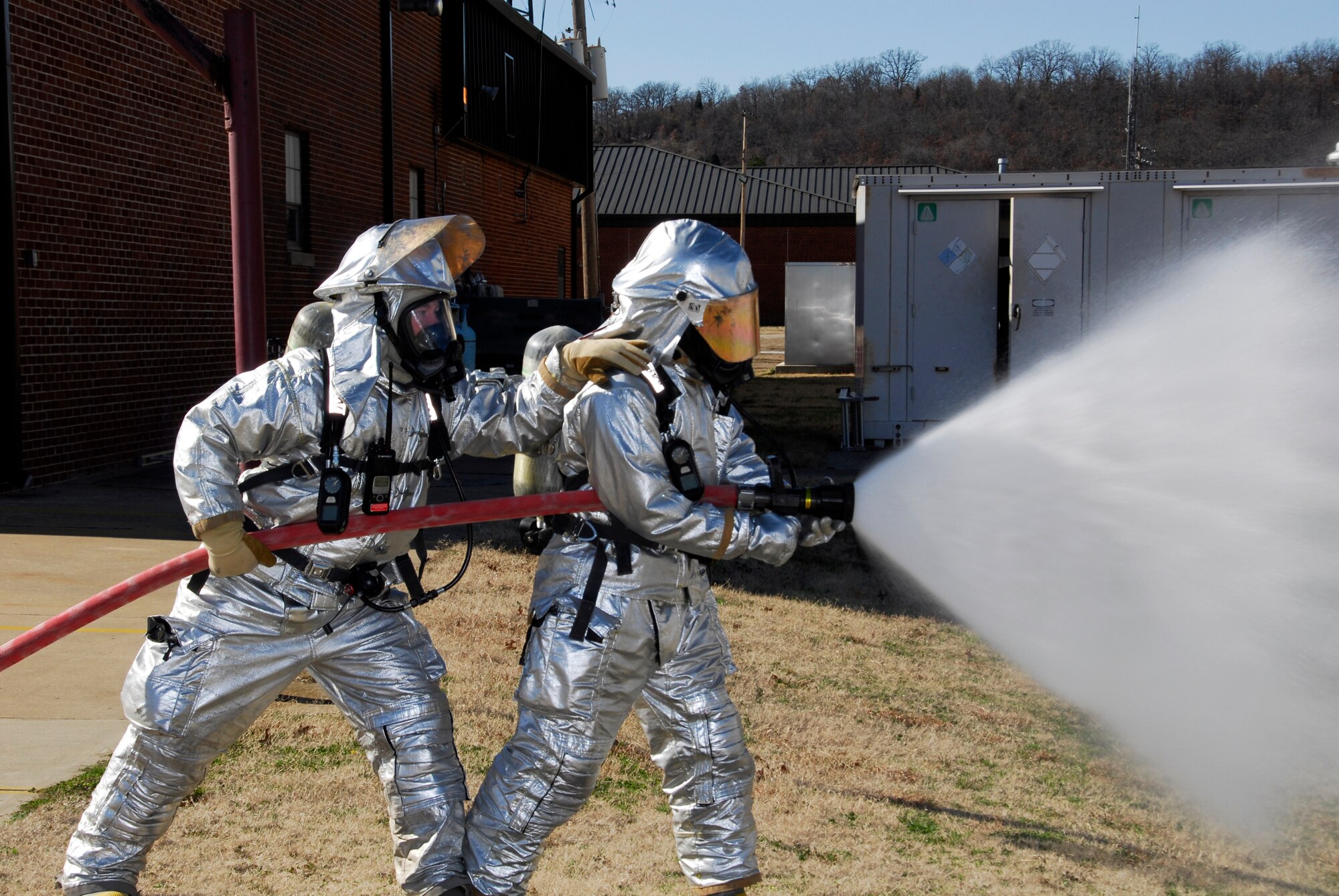 Airmen with the 188th Fire Emergency Services Flight conduct training at the 188th Fighter Wing during a Unit Training Assembly Feb. 11, 2012. In addition to the 188th FESF’s primary mission of providing fire protection to military aircraft and installation facilities, it also responds to emergency calls for commercial and civilian aircraft as well as medical emergencies through a joint-use agreement with the Fort Smith Regional Airport. (National Guard photo by Airman 1st Class John Hillier/188th Fighter Wing Public Affairs)

