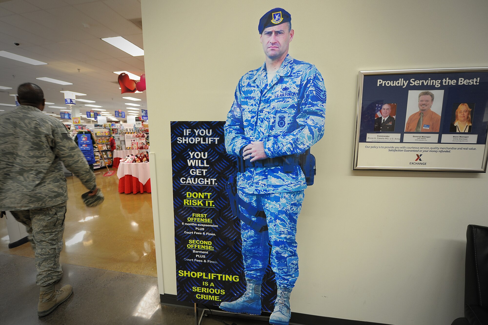 A Security Forces replica cut-out warns of the penalties of shoplifting at The Exchange at Cannon Air Force Base, N.M., Feb. 10, 2012. The Exchange currently has 48 cameras installed and is awaiting 16 more by mid-March. (U.S. Air Force photo by Airman 1st Class Alexxis Pons Abascal)  