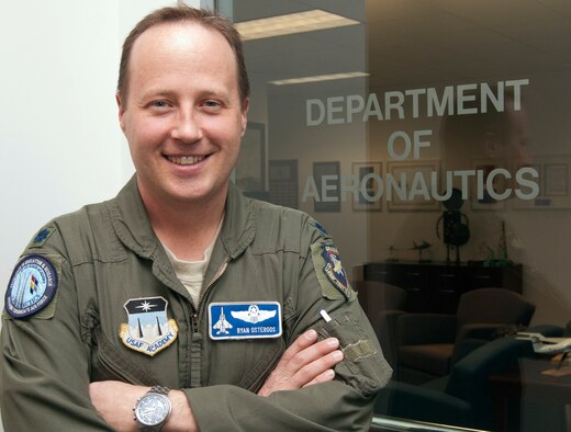 Lt. Col. Ryan Osteroos is the assistant professor for the Air Force Academy's Aeronautics Department and a 1994 Academy graduate. Osteroos and 15 cadets in his flight test techniques class were at the Reno Air Races Sept. 16, 2011, when a modified P-51 Mustang crashed into the stands. The Colorado Springs Red Cross named Osteroos its military hero for responding to the accident and providing aid for victims at the scene. (U.S. Air Force photo/Don Branum)