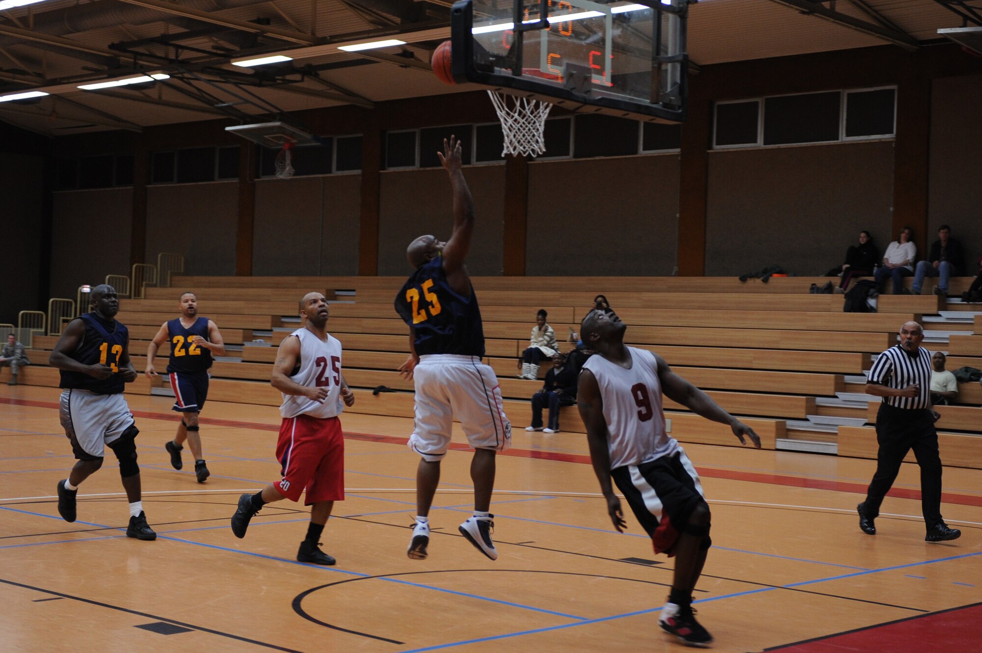 SPANGDAHLEM AIR BASE, Germany – Richard Goines, 52nd Communications Squadron, shoots a layup during the over-30 basketball league championship game at the Skelton Memorial Fitness Center here Feb. 13. The AMS defeated the CS 48-35 to win the championship game with an undefeated record. (U.S. Air Force photo by Airman 1st Class Matthew B. Fredericks/Released)