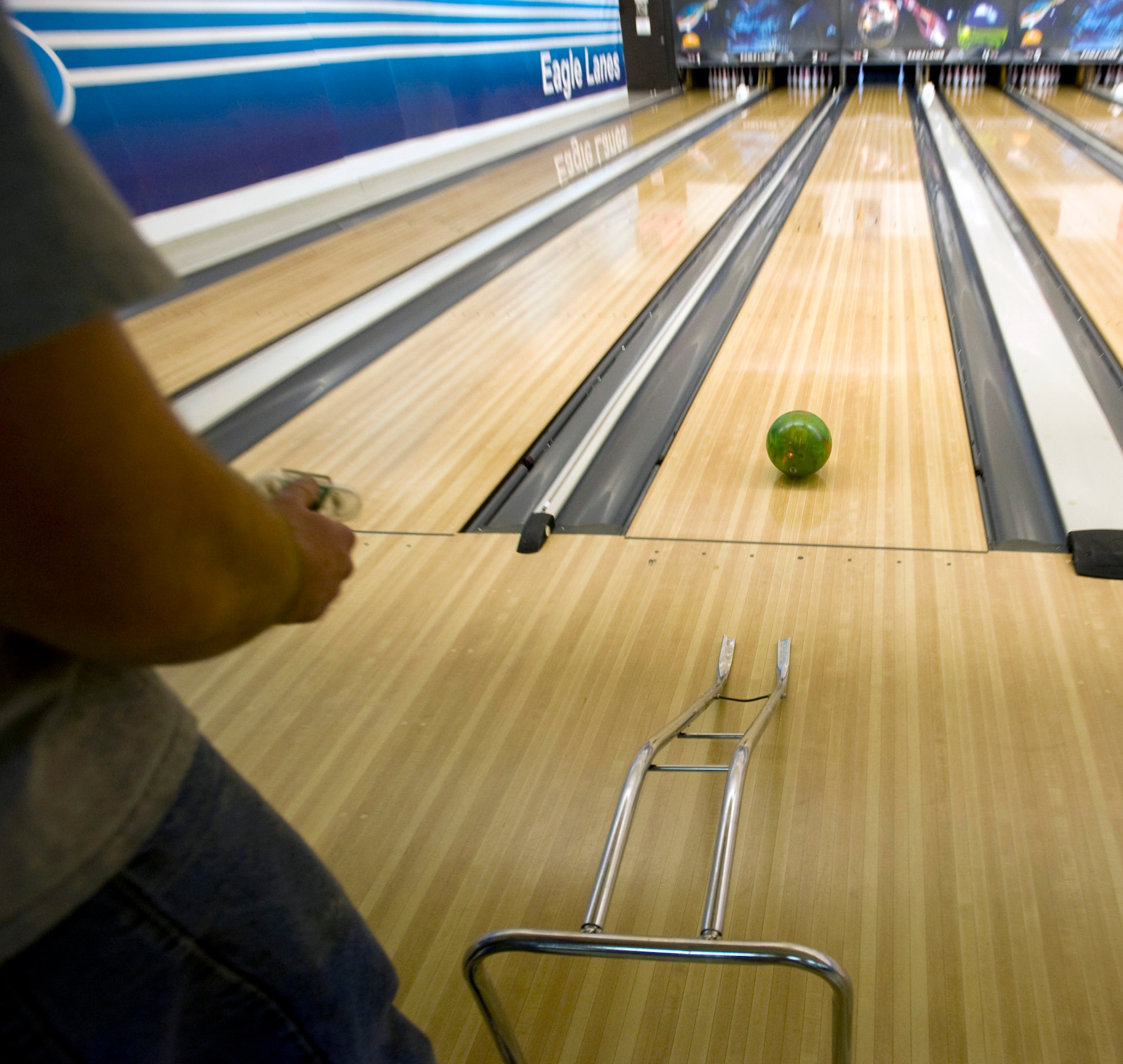 The Eagle Lanes Bowling Center's remote-controlled bowling ball travels down the lane Feb. 9, 2012, at the Dover Air Force Base, Del. The ball was given to the bowling alley for use by wounded service members. (U.S. Air Force photo by Senior Airman Matthew Hubby)