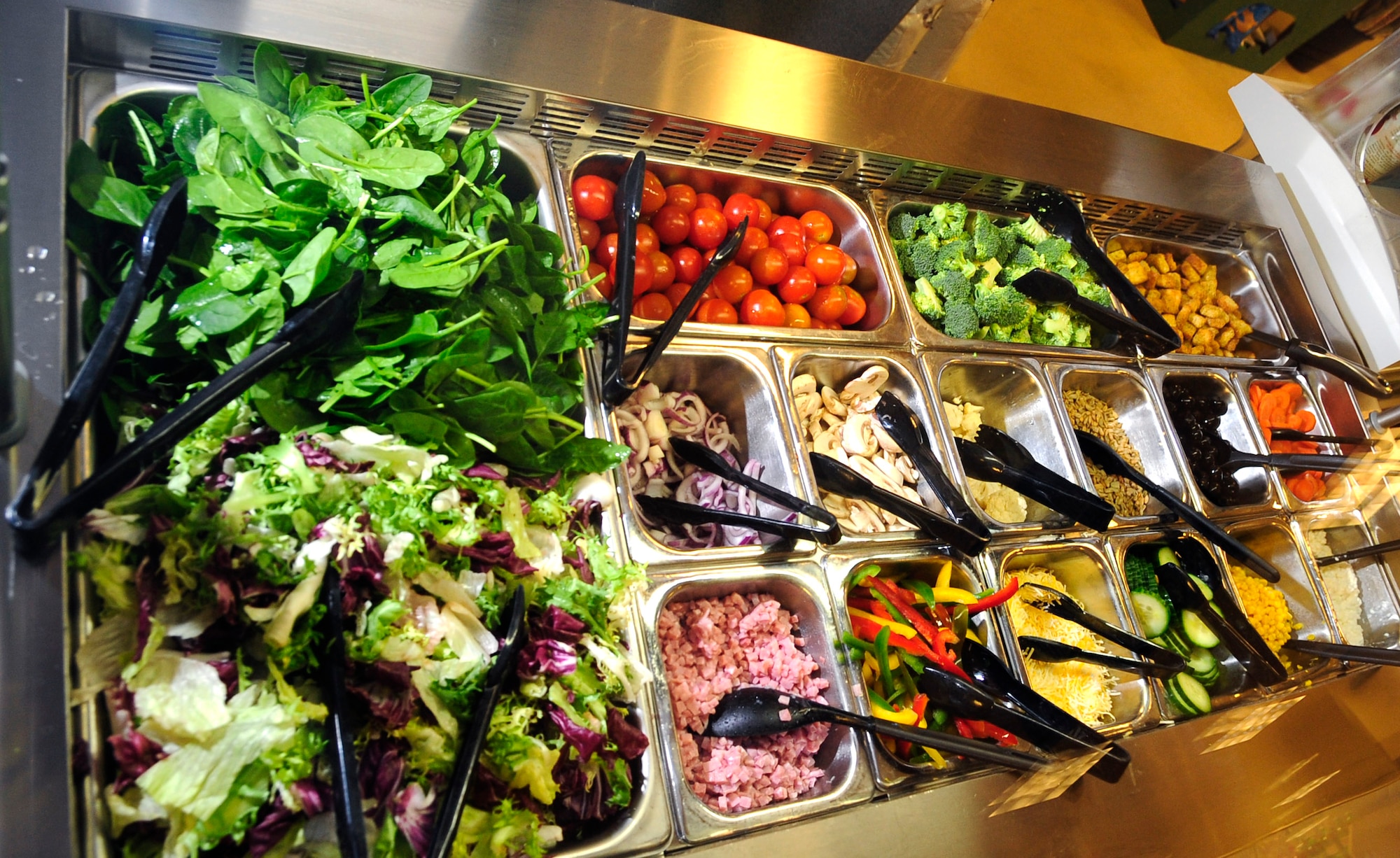 RAF MILDENHALL, England – The 2011 Quality of Life Survey revealed Team Mildenhall wanted healthier eating options. The Defense Commissary Agency installed a salad bar at the RAF Mildenhall Commissary. The 2012 QoL Survey is now out for Team Mildenhall to participate in. (U.S. Air Force photo/Senior Airman Ethan Morgan)