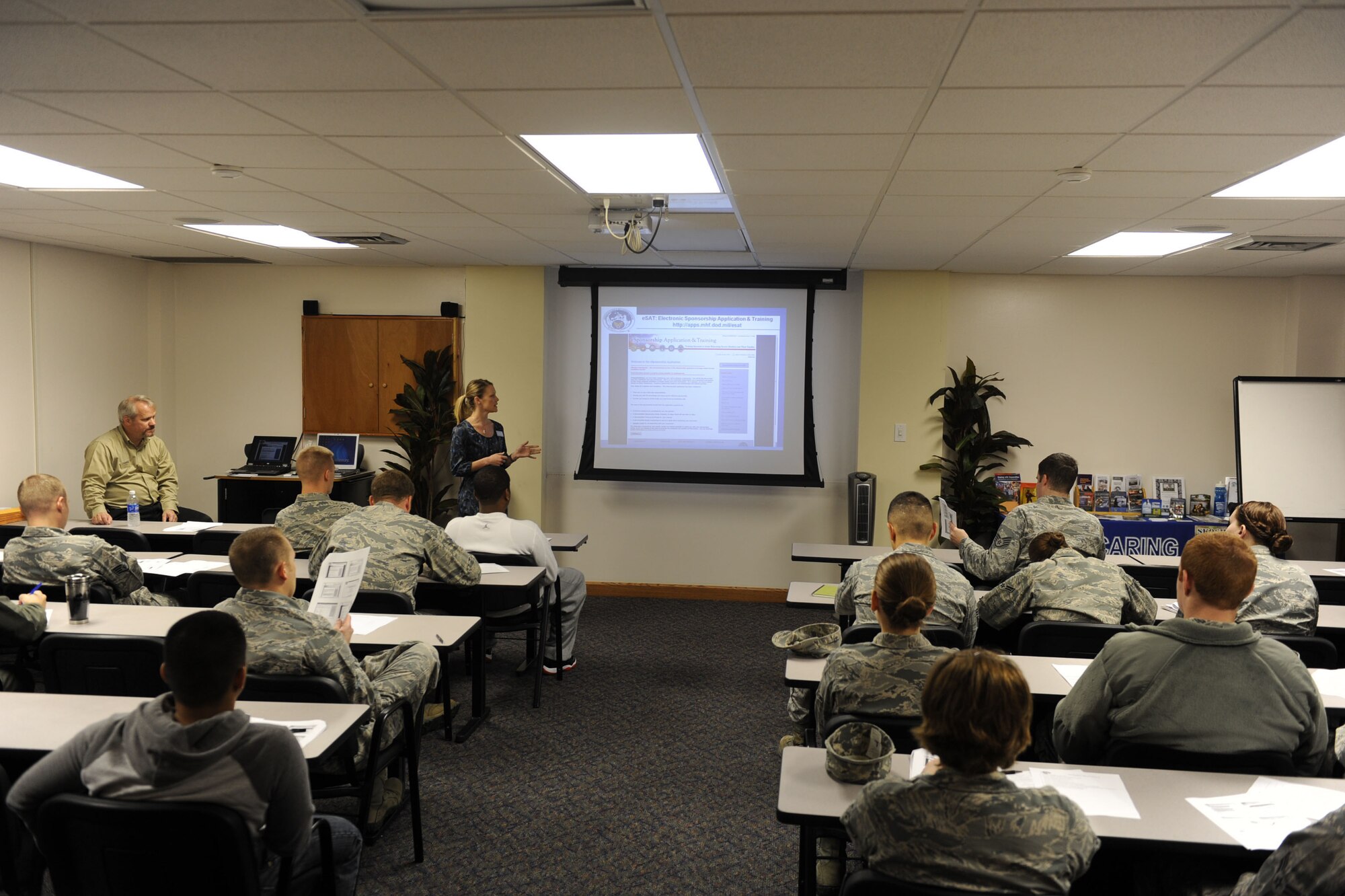 Mrs. Cecily Gaudinski, 18th Force Support Squadron community readiness technician, speaks to a class about the importance of the Sponsorship Program and being a responsible sponsor at the Airman and Family Readiness Center on Kadena Air Base, Japan, Feb. 2, 2012. The A&FRC hosts the
Sponsorship Program designed to take care of Kadena's arriving Airmen and their families. (U.S. Air Force photo by Airman 1st Class Justin Veazie/Released)
