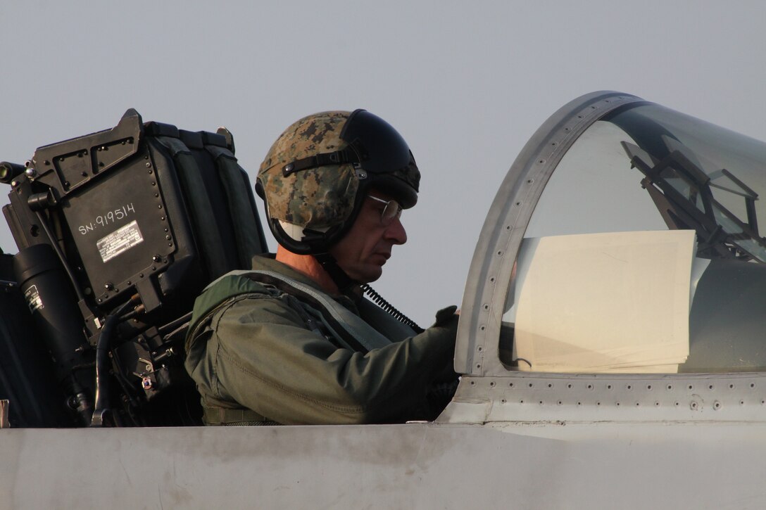 Maj. Gen. William D. Beydler, commanding general, 1st Marine Aircraft Wing, III Marine Expeditionary Force prepares to fly a Marine All-Weather Fighter Attack Squadron 242 F/A-18 during Exercise Cobra Gold 2012. Cobra Gold is a reoccurring multinational and multiservice exercise hosted by the Kingdom of Thailand. It is designed to advance regional security by exercising a multinational force from nations sharing common goals and security commitments in the Asia-Pacific region.