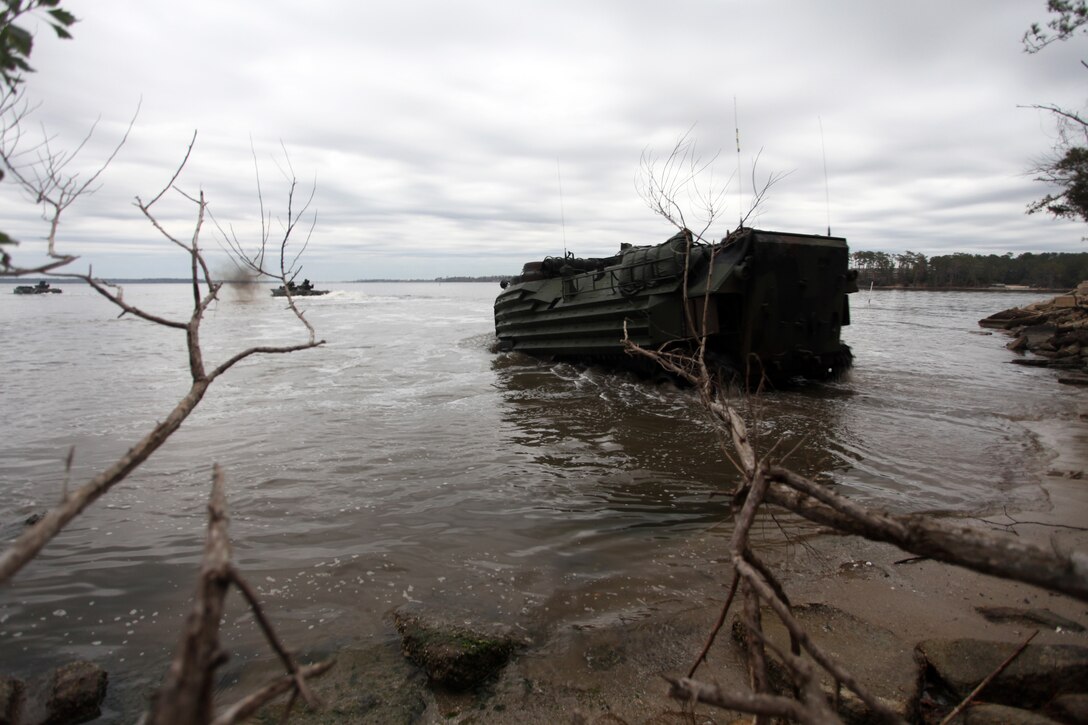 An Assault Amphibious Vehicle with Alpha Company, Battalion Landing Team 1st Battalion, 2nd Marine Regiment, 24th Marine Expeditionary Unit, enters the New River to assault a mock enemy encampment on the other side of the base here, Feb. 13, 2012. This mechanized riad was part of the 24th MEU’s Certification Exercise (CERTEX) with Iwo Jima Amphibious Ready Group, which took place Jan. 27 to Feb. 16, and included a series of missions intended to evaluate and certify the unit for their upcoming deployment.