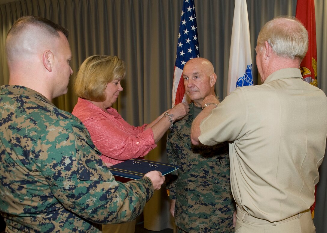 Commander, U.S. Pacific Command Adm. Robert Willard and Mrs. Conant pin three stars on the next PACOM deputy commander, Lt. Gen. Thomas Conant in a ceremony here today. Lt. Gen. Conant will be the first U.S. Marine to serve as the deputy commander of the Pacific Command once he assumes those duties as directed. 