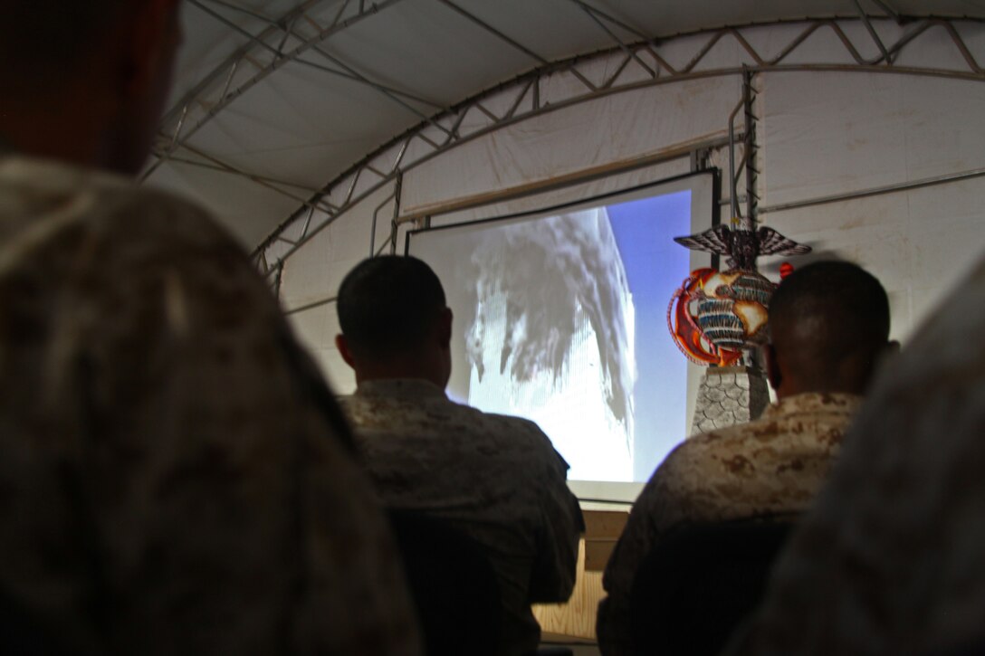 Marines watch the Marine Corps birthday message during the 236th birthday ceremony aboard Camp Leatherneck, Helmand province, November 10. It is tradition that Marines across the world, regardless of operational tempo, take time out of their day on the Marine Corps birthday to honor their beloved Corps history and legacy.