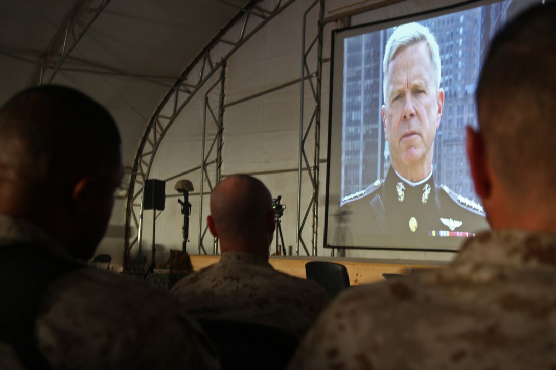 Marines watch the Marine Corps birthday message during the 236th birthday ceremony aboard Camp Leatherneck, Helmand province, November 10. It is tradition that Marines across the world, regardless of operational tempo, take time out of their day on the Marine Corps birthday to honor their beloved Corps history and legacy.