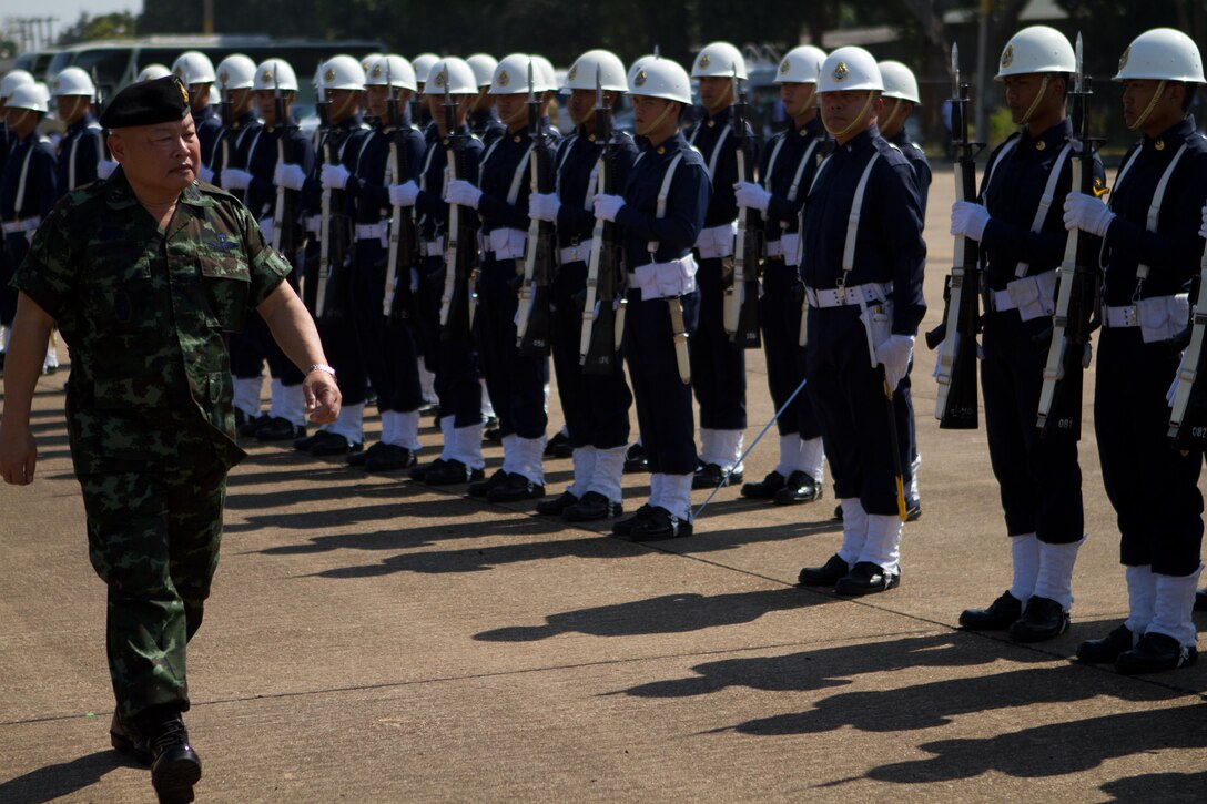 Royal Thai Gen. Sakol Sajjanit, deputy chief of Royal Thai Defense Forces inspects Thai service members upon his arrival to Camp Suranaree. Sajjanit spoke at the open ceremony that kicked off Exercise Cobra Gold 2012. The exercise is an annual Thai-U.S. co-sponsored joint and multinational exercise designed to advance security throughout the Asia-Pacific region and enhance interoperability with participating nations. 
