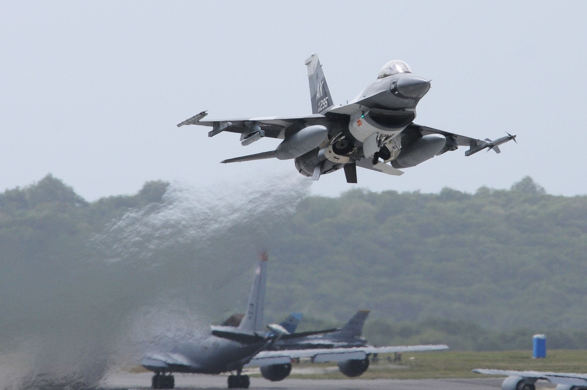ANDERSEN AIR FORCE BASE, Guam- A F-16 Fighting Falcon Aggressor takes off from here, during Cope North 2012 flying operations Feb.15. Exercise Cope North 2012 kicked off Feb. 11 here bringing more than 1,000 military members to the island of Guam. The three-week exercise, featuring U.S. Air Force, Japan Air Self Defense Force and Royal Australian Air Force assets and servicemembers, demonstrates the three nations’ commitment to peace and stability in the Pacific Region.  (U.S Air Force photo/Senior Airman Carlin Leslie)

