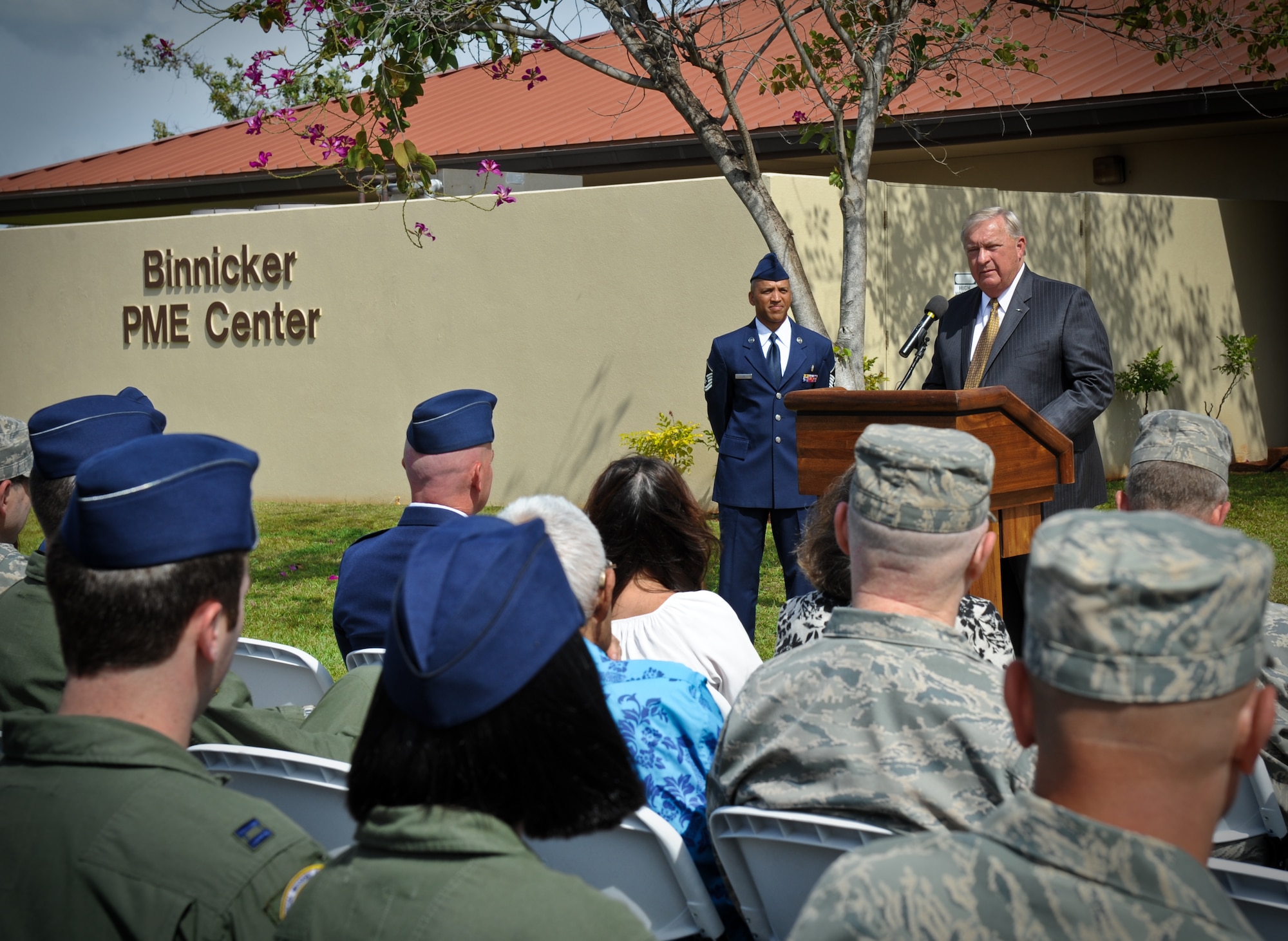 James Binnicker, the 9th Chief Master Sgt. of the Air Force speaks to members of Joint Base Pearl Harbor-Hickam, Hawaii Feb. 15 at a commemorative ceremony honoring Binnicker by renaming the Professional Military Education center here in his honor. Binnicker is credited with revising and improving Air Force PME during his tenure as CMSAF. (U.S. Air Force photo/Senior Airman Lauren Main)