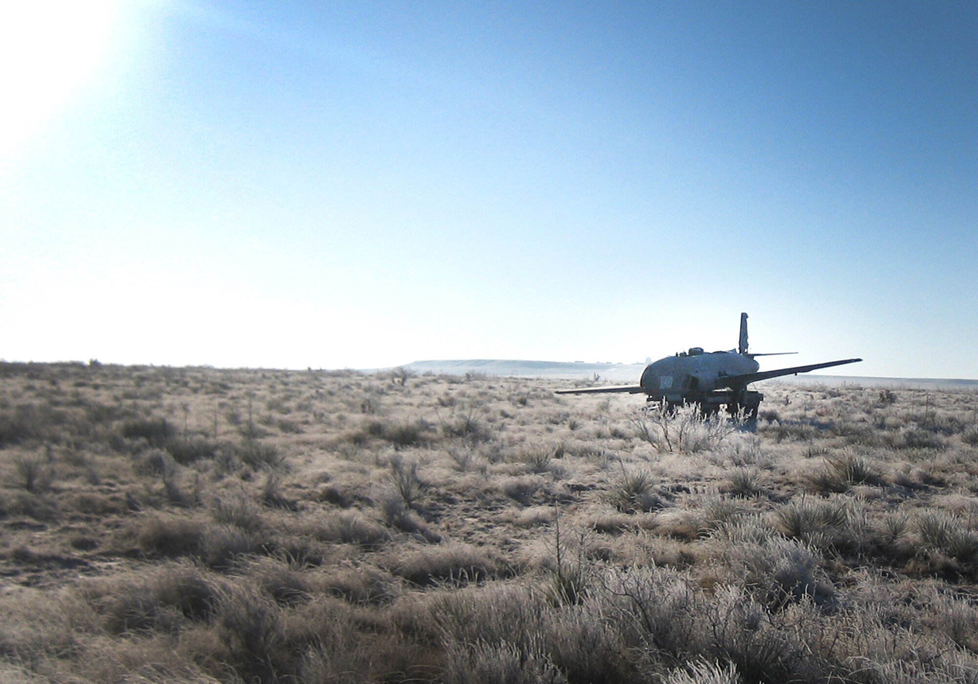 A retired aircraft used for training simulated a U-28 rolling off the end of the runway during a 27th Special Operations Wing exercise at Melrose Air Force Range, N.M., Feb. 13, 2012. The aircraft is part of outdated inventory at Melrose and was positioned on the field for the purpose of the exercise. (U.S. Air Force photo by Maj. Mike Janssen) 