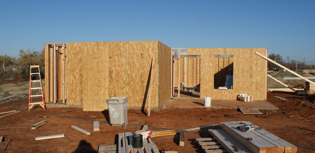 The walls going up on day two of a Habitat for Humanity home build made up of volunteers from the 362nd Training Squadron Dec. 7, 2011 in Wichita Falls, Texas.  Members of the 362nd Training Squadron from Sheppard AFB, Texas recently participated in the first-ever home build by an all-military manned volunteer crew for the Wichita Falls, Texas, Habitat for Humanity.  (U.S. Air Force photo/Dan Hawkins)