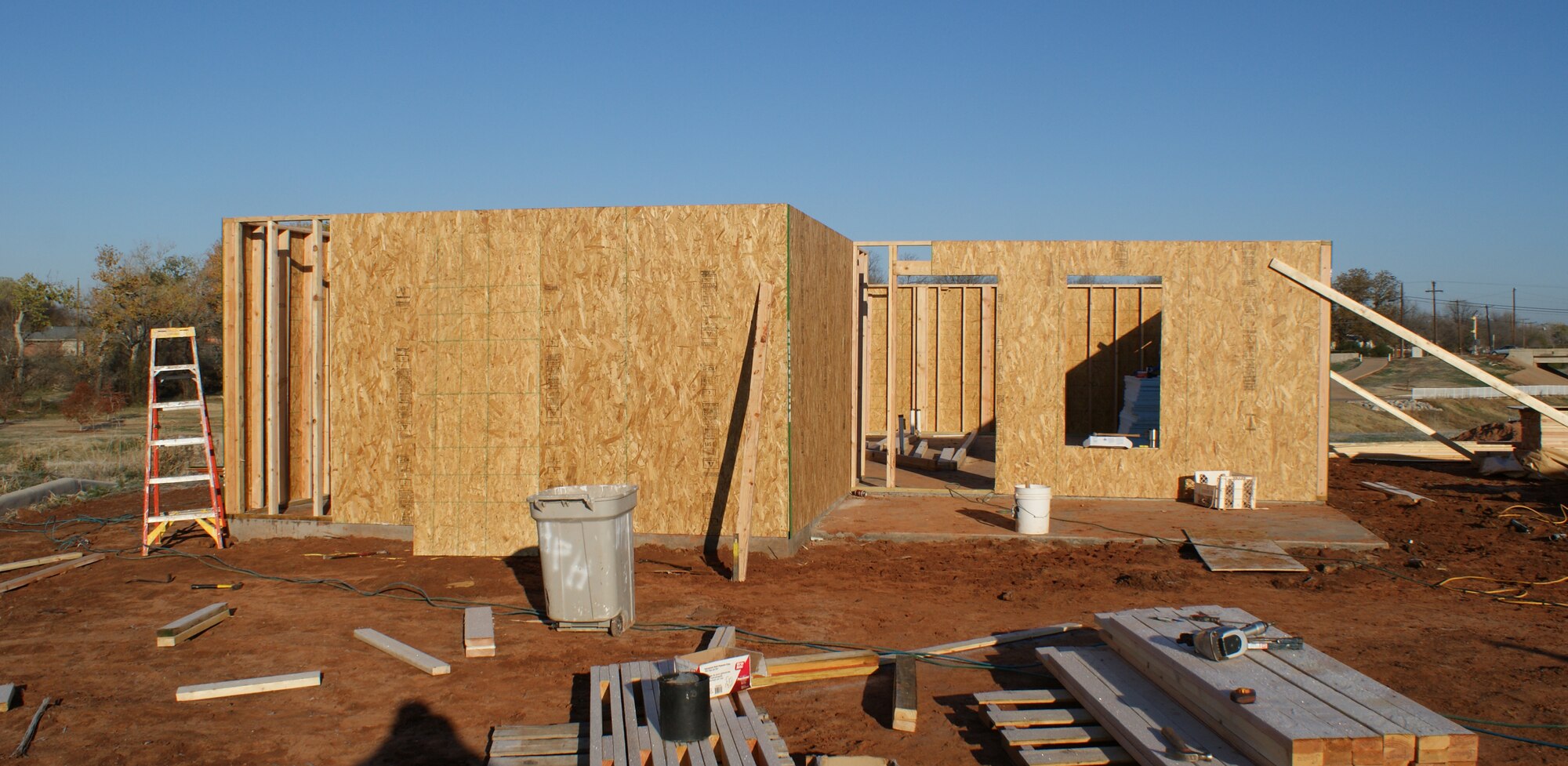 The walls going up on day two of a Habitat for Humanity home build made up of volunteers from the 362nd Training Squadron Dec. 7, 2011 in Wichita Falls, Texas.  Members of the 362nd Training Squadron from Sheppard AFB, Texas recently participated in the first-ever home build by an all-military manned volunteer crew for the Wichita Falls, Texas, Habitat for Humanity.  (U.S. Air Force photo/Dan Hawkins)