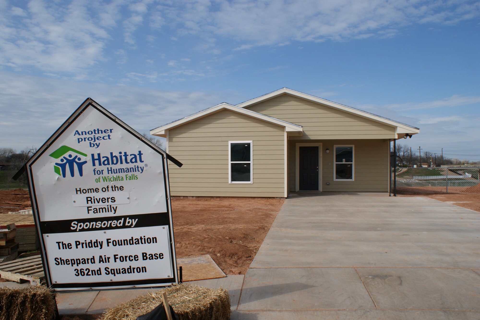 A Habitat for Humanity home completely built by volunteers from the 362nd Training Squadron stands ready for the homeowners on Feb. 12, 2012 in Wichita Falls, Texas.  Members of the 362nd Training Squadron from Sheppard AFB, Texas recently participated in the first-ever home build by an all-military manned volunteer crew for the Wichita Falls, Texas, Habitat for Humanity.  (U.S. Air Force photo/Dan Hawkins)