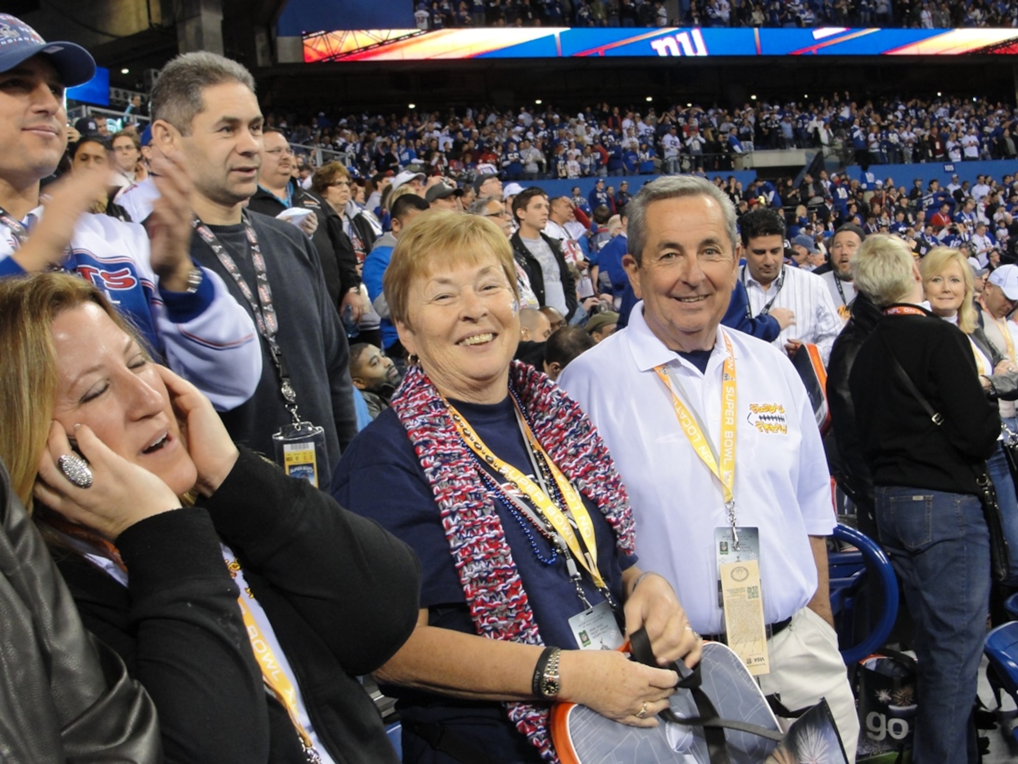 Retired Master Sgt. Jim Lynch and his wife Pat of Patrick Air Force Base, Fla., pose for a photo from the stands of Lucas Oil Stadium during Super Bowl XLVI Feb. 5 in Indianapolis. Lynch was one of four Air Force club members who participated in the annual Football Frenzy promotion and won a four-day trip to the sporting event. (Courtesy photo)