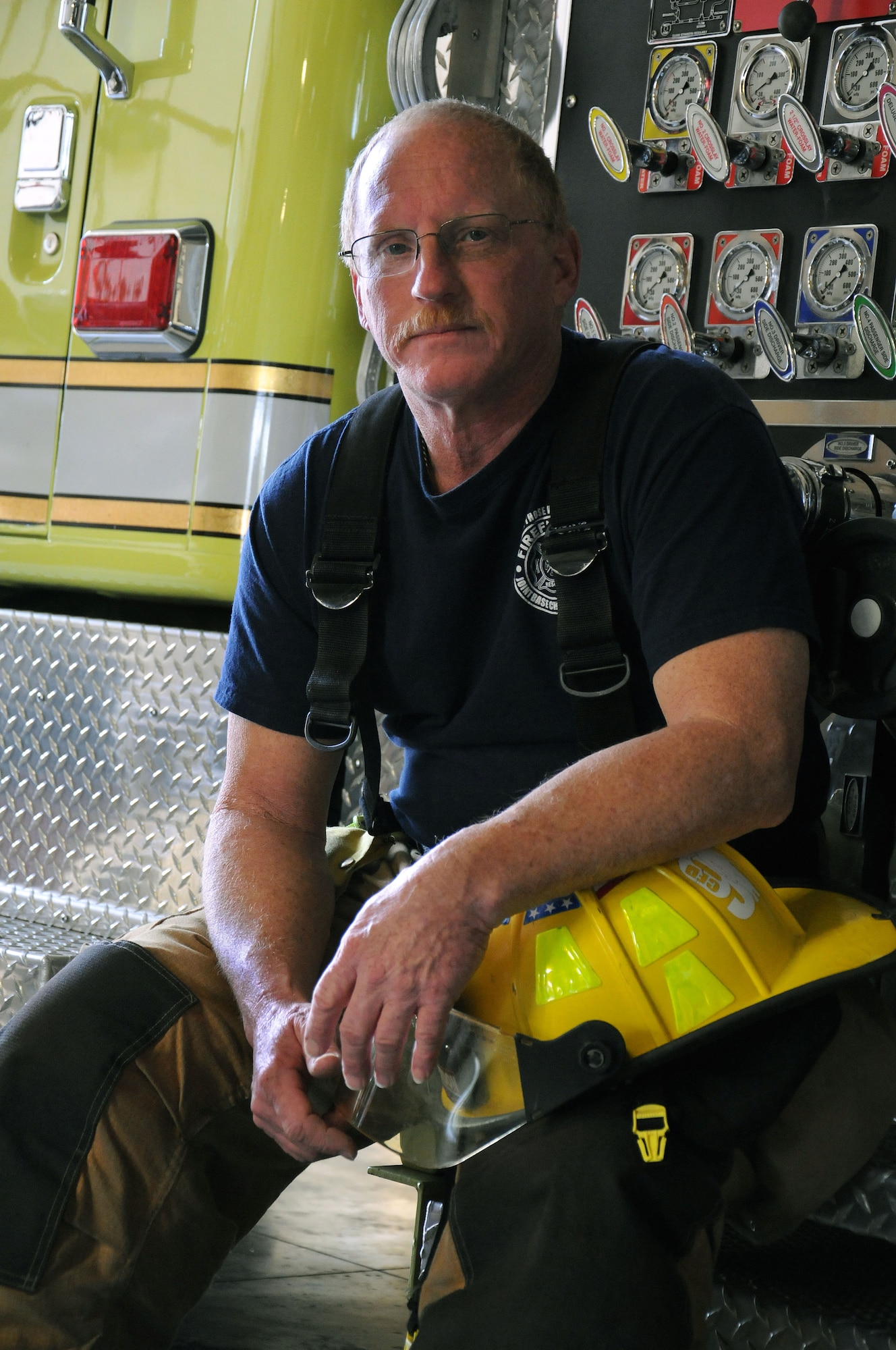 Firefighter Glen McLendon has donned his uniform for the past 30 years. Mclendon  began his career by volunteering at a local fire station when he was 16-years-old and is now a member of the 628th Civil Engineering Squadron/Civil Engineer Fire Department at Joint Base Charleston - Weapons Station. (U.S. Navy photo/Petty Officer 1st Class Jennifer Hudson)