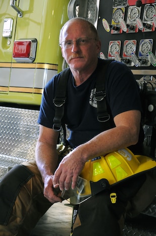 Firefighter Glen McLendon has donned his uniform for the past 30 years. Mclendon  began his career by volunteering at a local fire station when he was 16-years-old and is now a member of the 628th Civil Engineering Squadron/Civil Engineer Fire Department at Joint Base Charleston - Weapons Station. (U.S. Navy photo/Petty Officer 1st Class Jennifer Hudson)