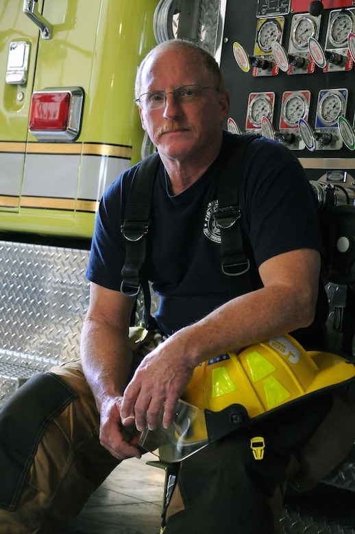 Firefighter Glen McLendon has donned his uniform for the past 30 years. Mclendon  began his career by volunteering at a local fire station when he was 16-years-old and is now a member of the 628th Civil Engineering Squadron/Civil Engineer Fire Department at Joint Base Charleston - Weapons Station. (U.S. Navy photo/Petty Officer 1st Class Jennifer Hudson)